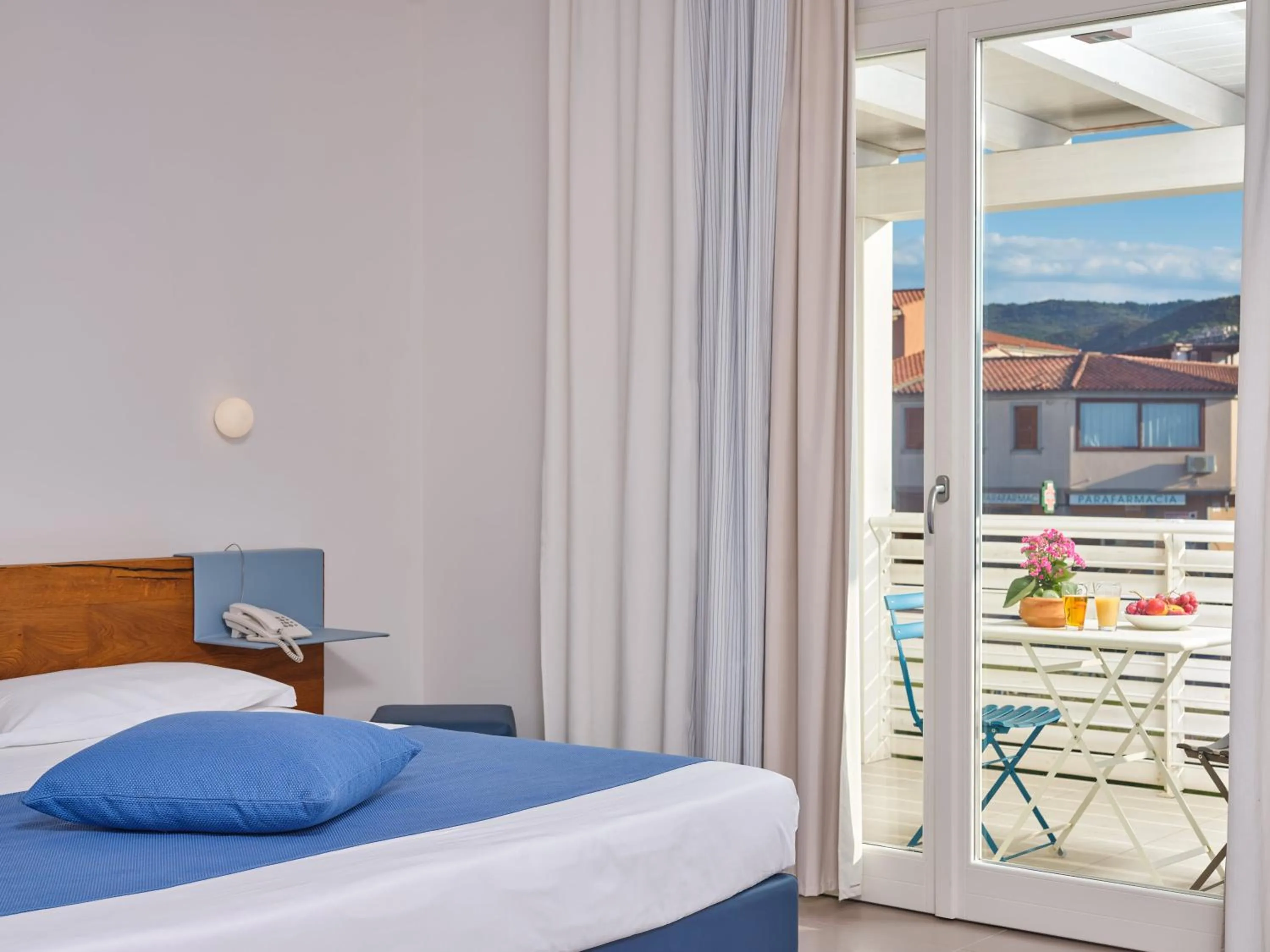 Bed in Felix Hotels - Hotel Residence Porto San Paolo