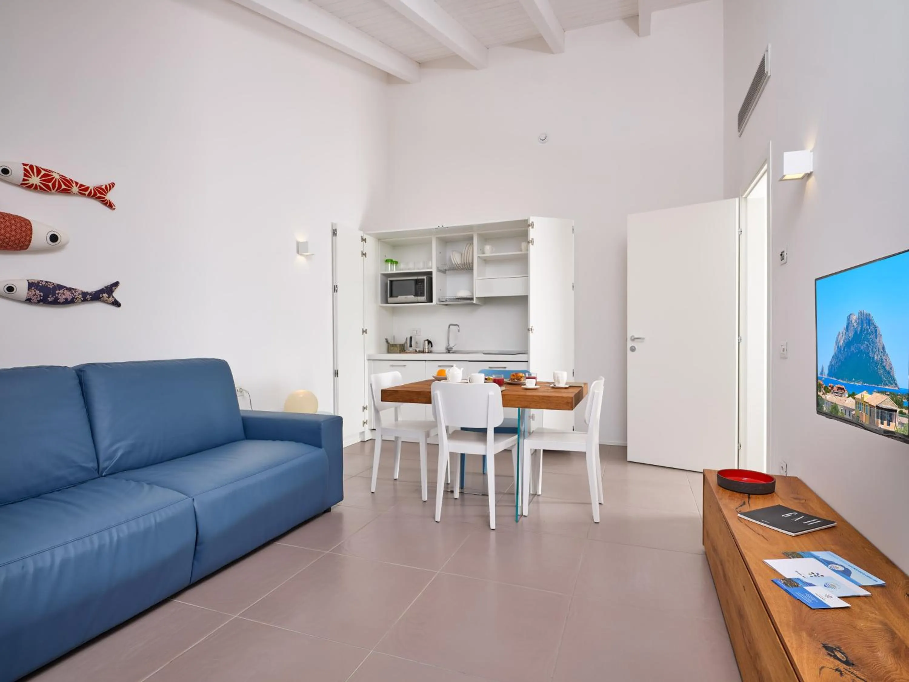 Kitchen or kitchenette in Felix Hotels - Hotel Residence Porto San Paolo