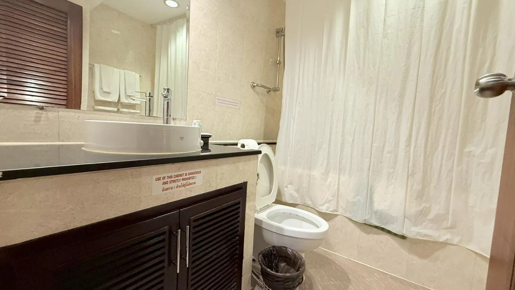 Toilet in Grand Business Inn