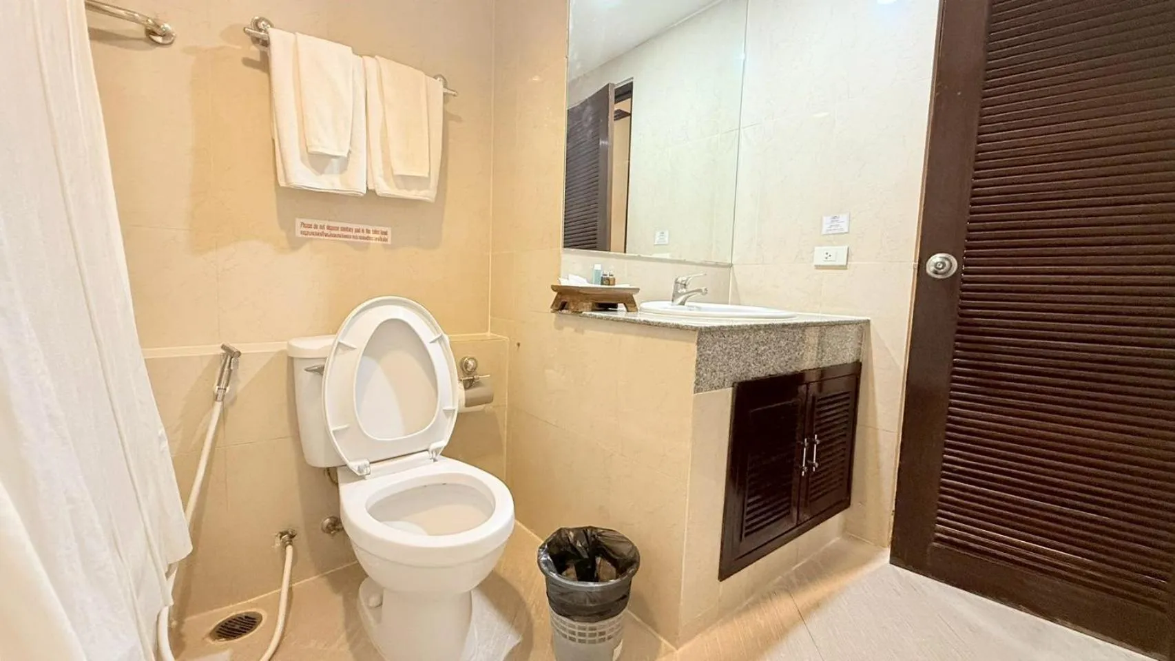 Toilet in Grand Business Inn