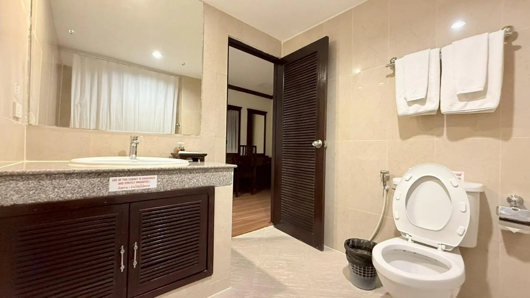 Toilet in Grand Business Inn