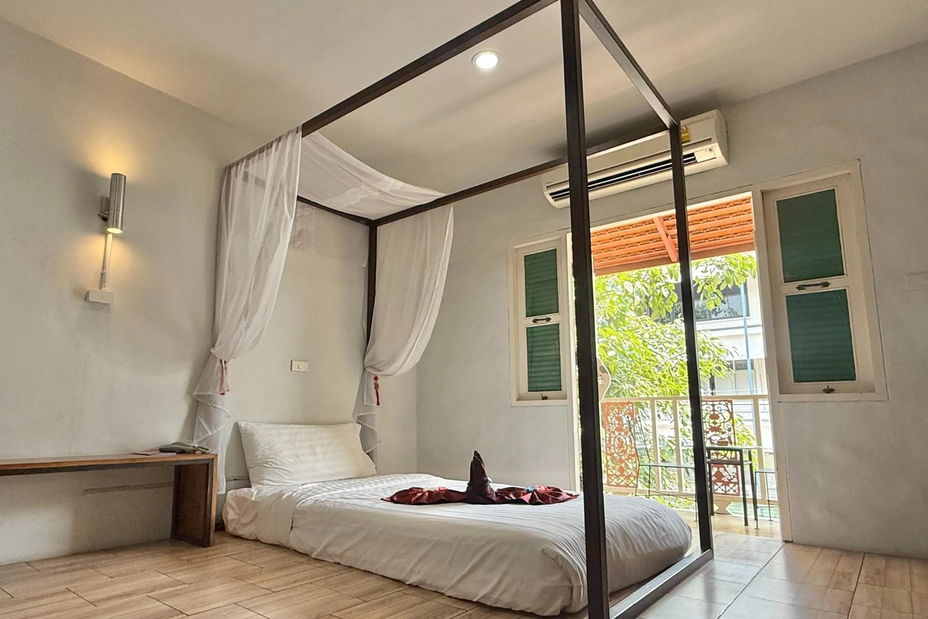 Bed in Sabaidee Chiangmai Hotel