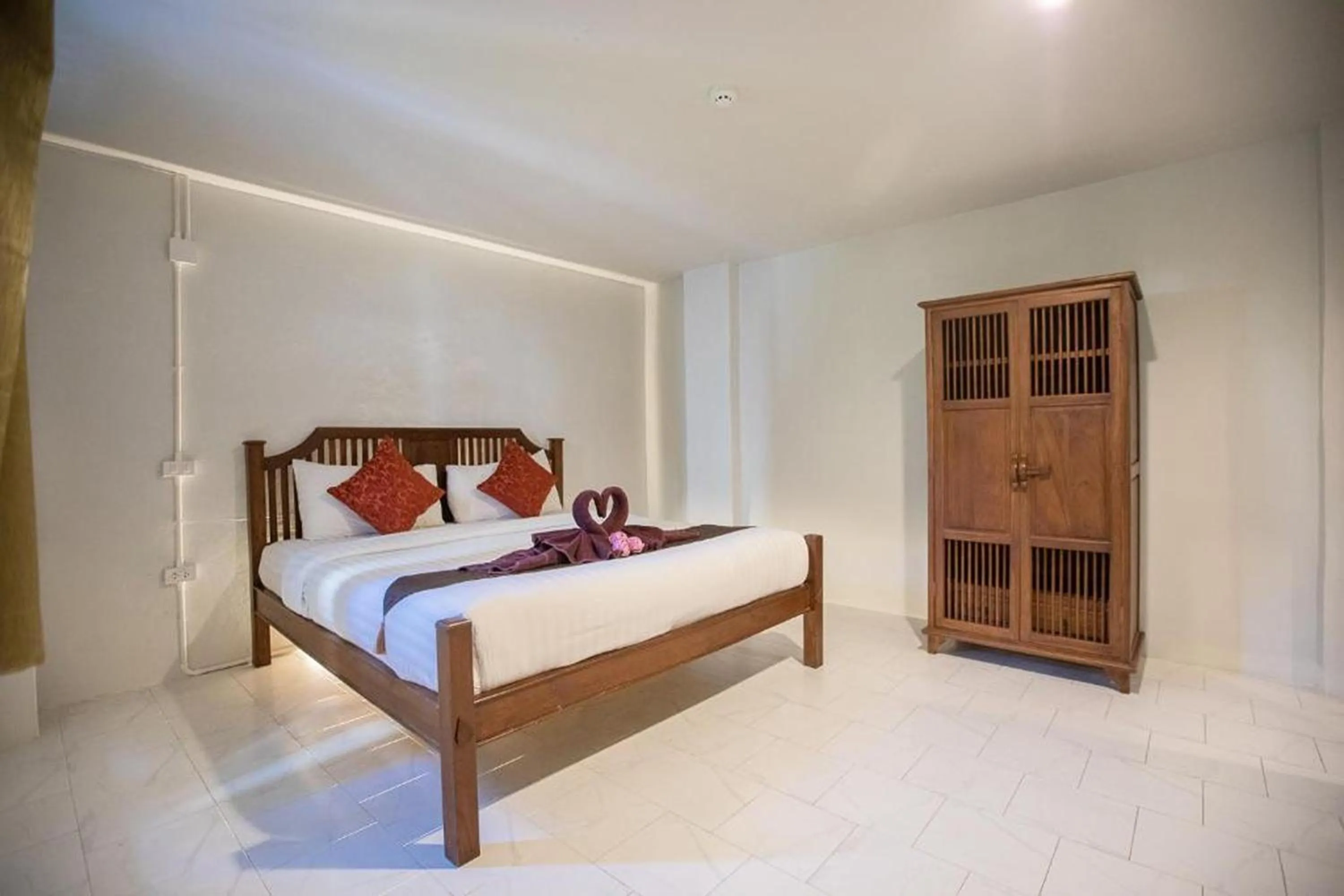 Bed in Sabaidee Chiangmai Hotel