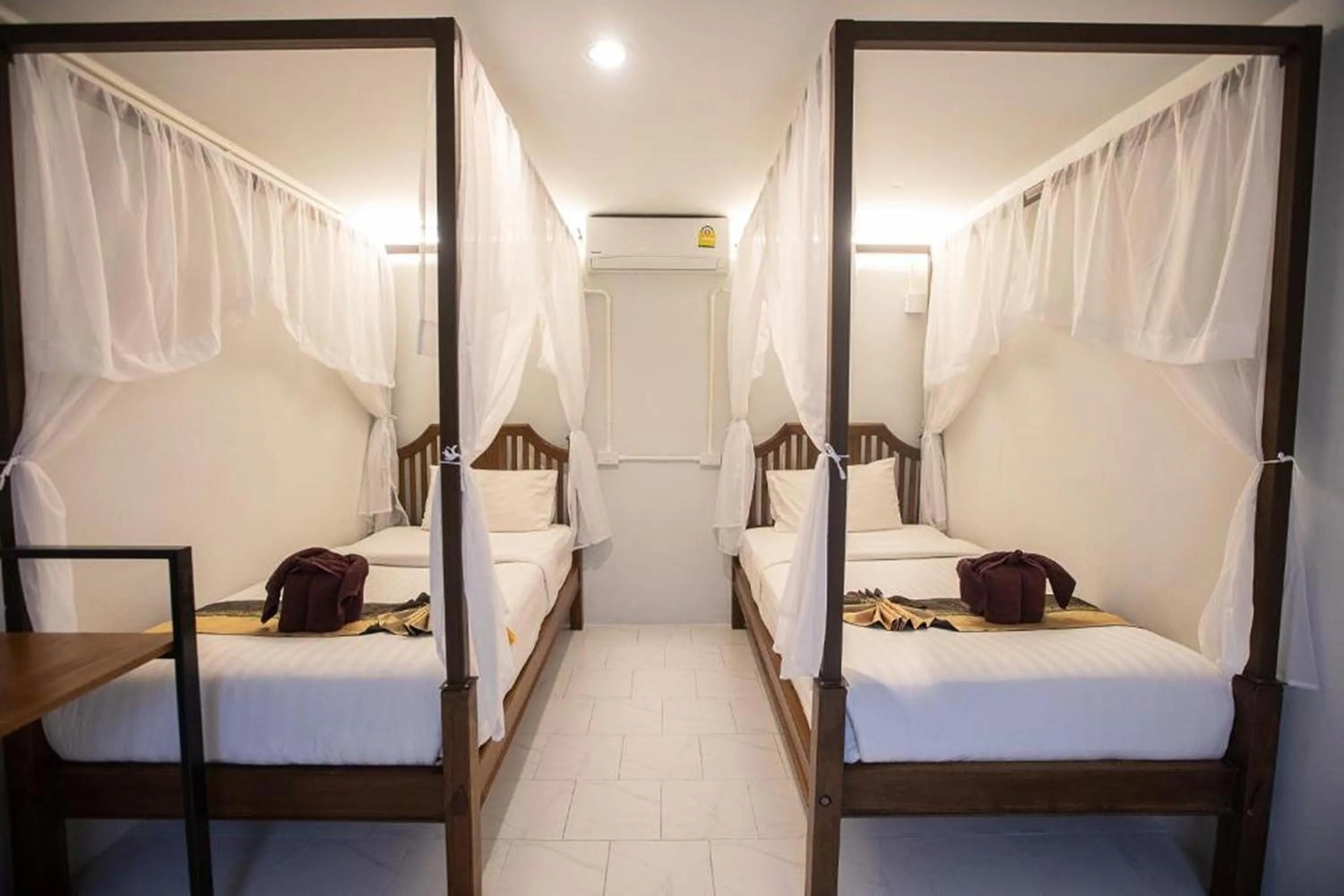 Bed in Sabaidee Chiangmai Hotel