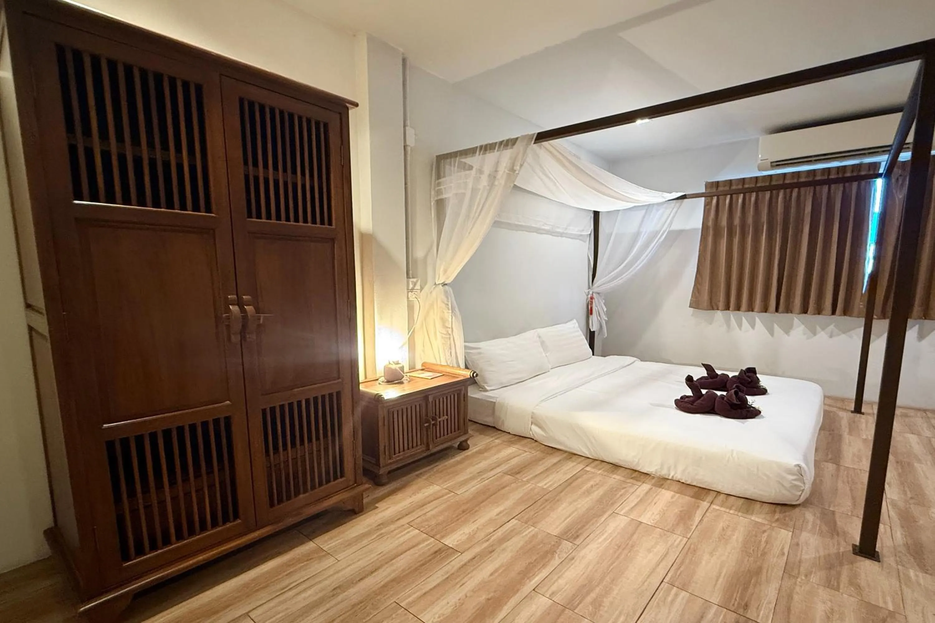 Bed in Sabaidee Chiangmai Hotel