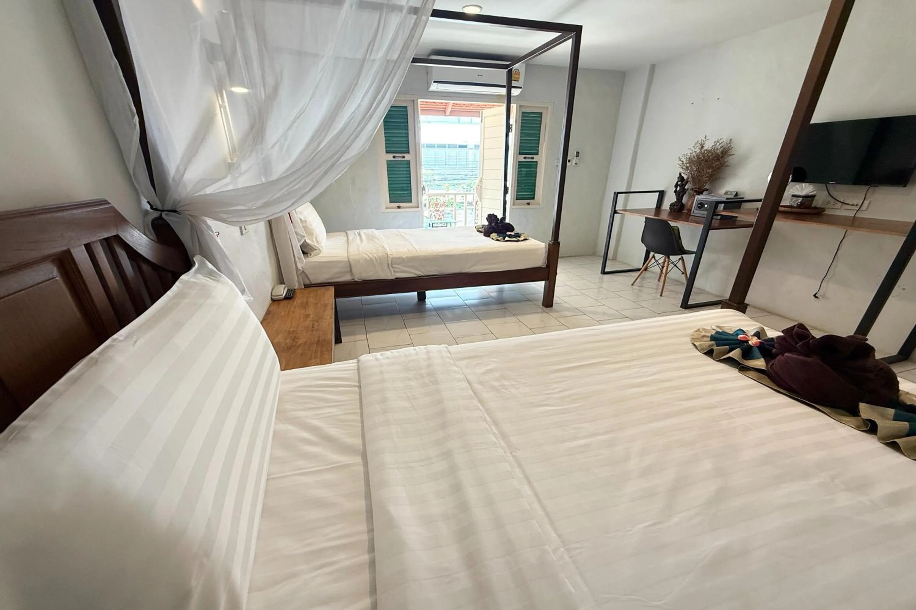 Bed in Sabaidee Chiangmai Hotel