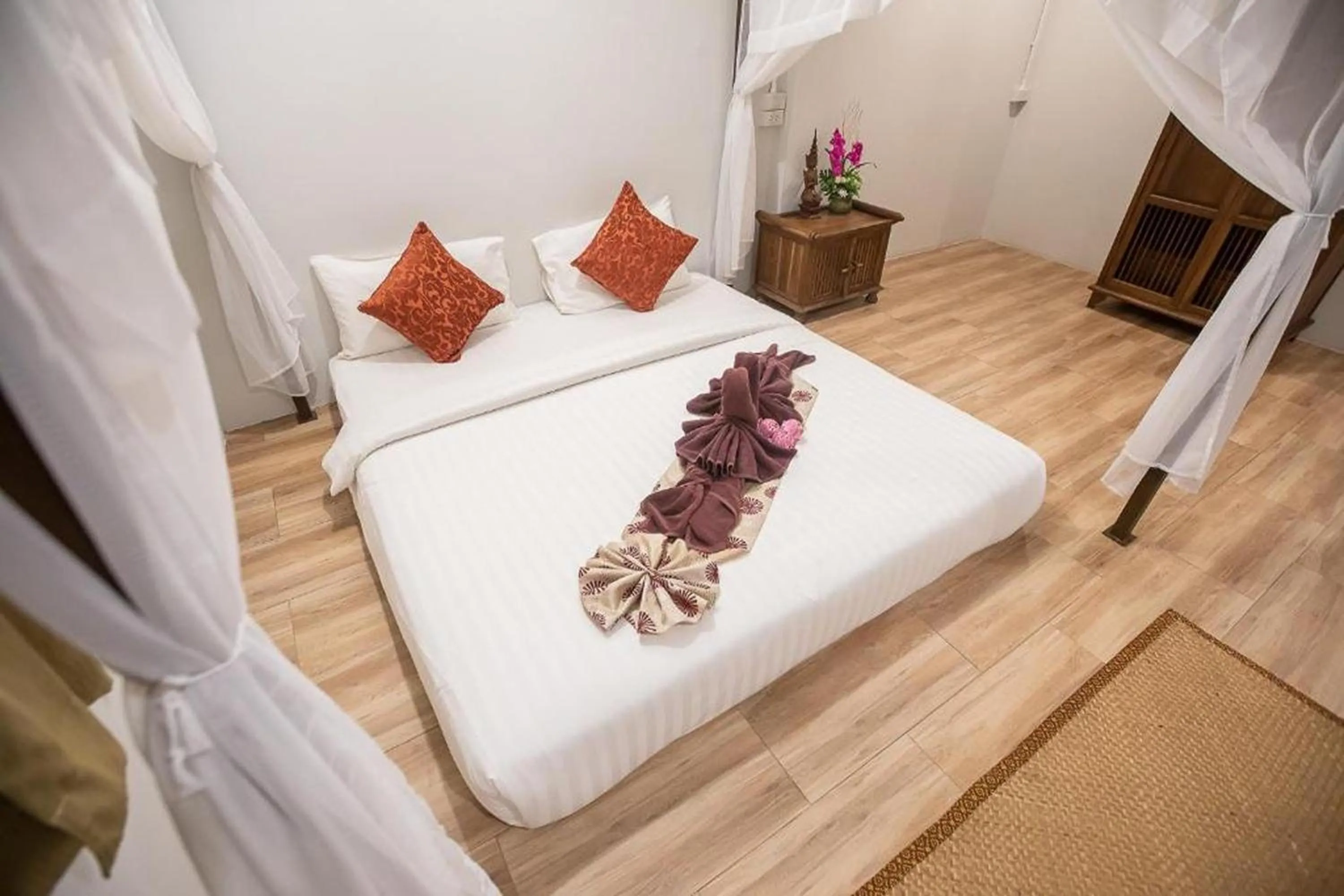 Bed in Sabaidee Chiangmai Hotel