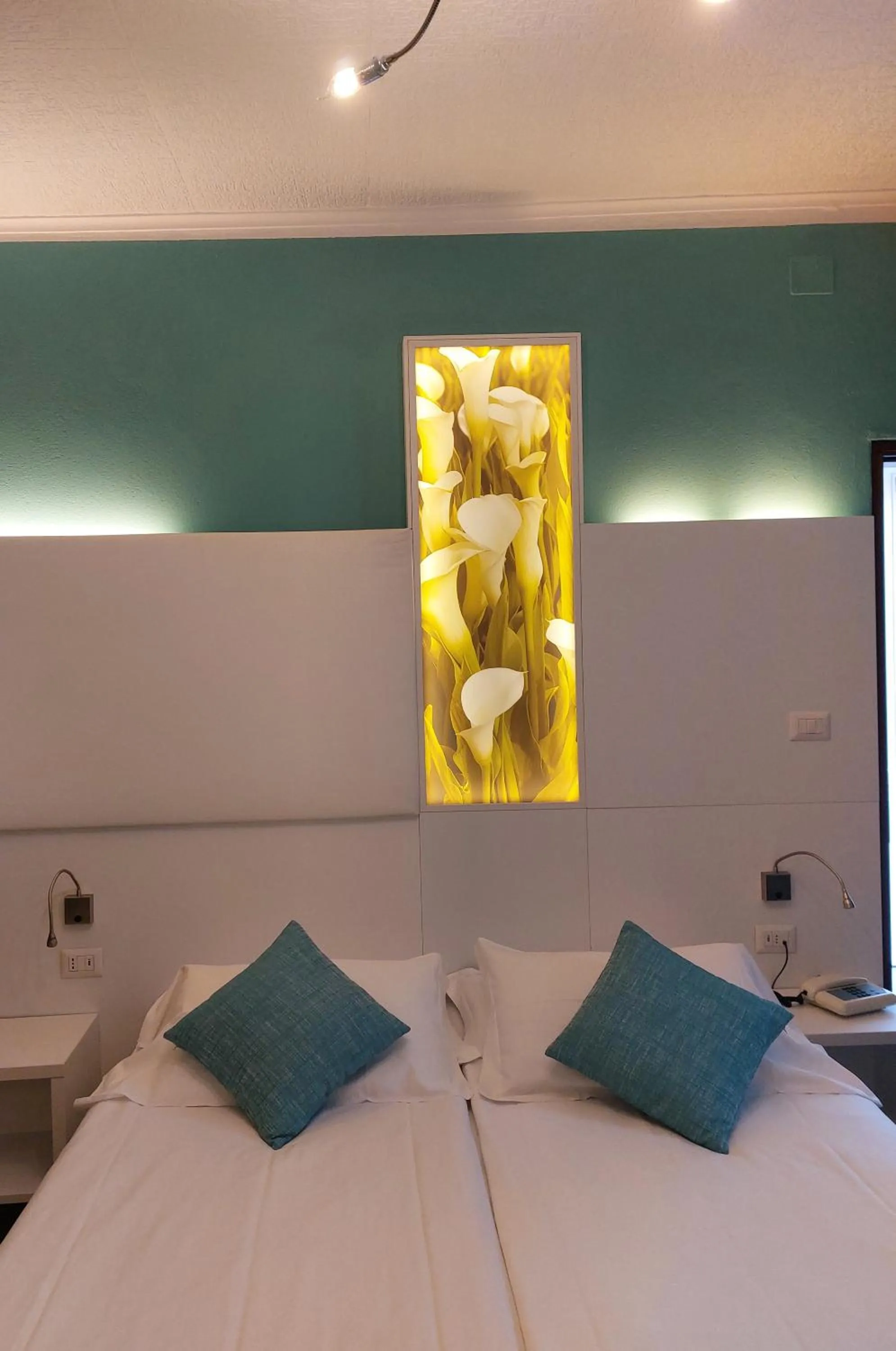 Bed in Albergo Pesce D'oro