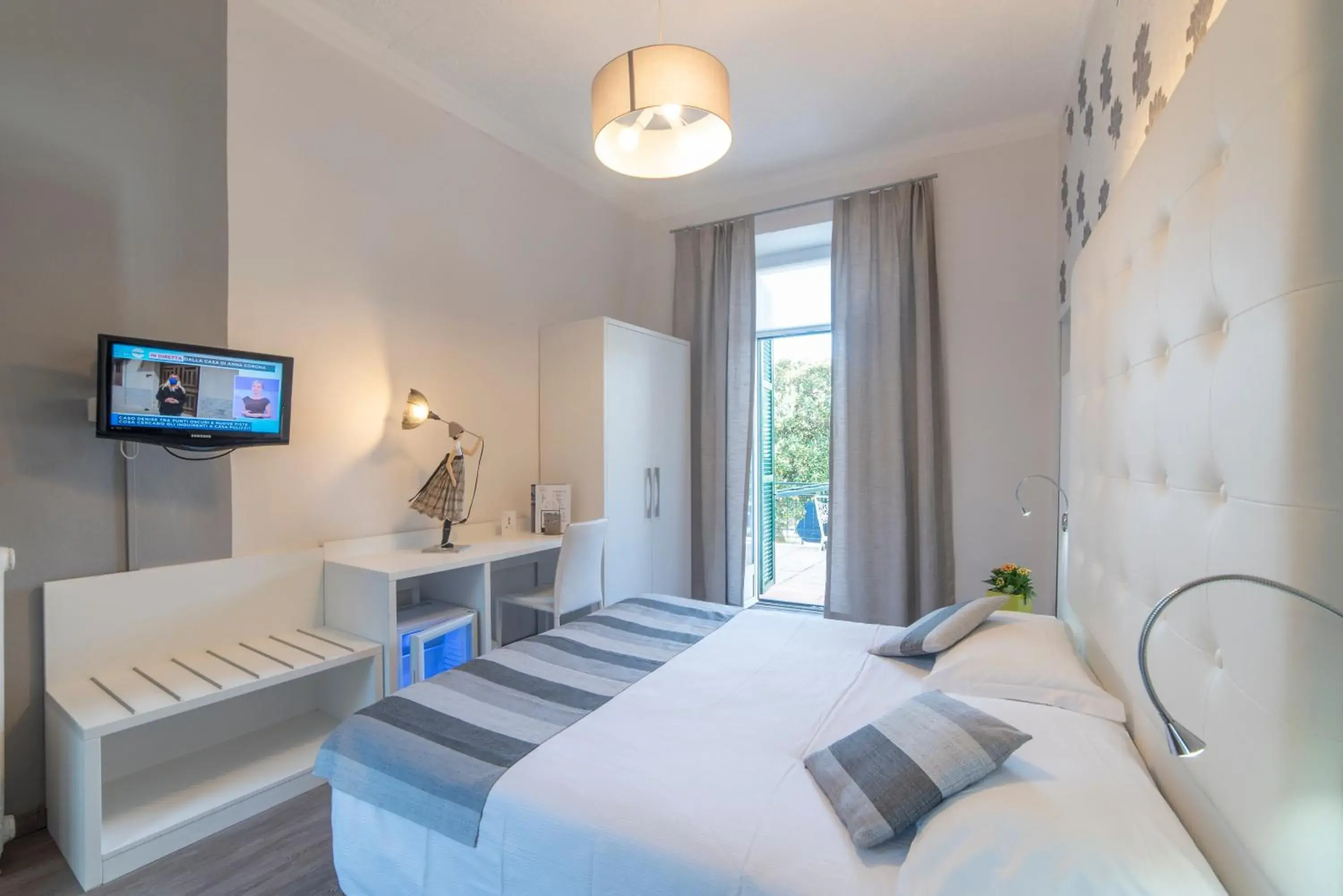 Bed in Albergo Pesce D'oro Bed in Albergo Pesce D'oro