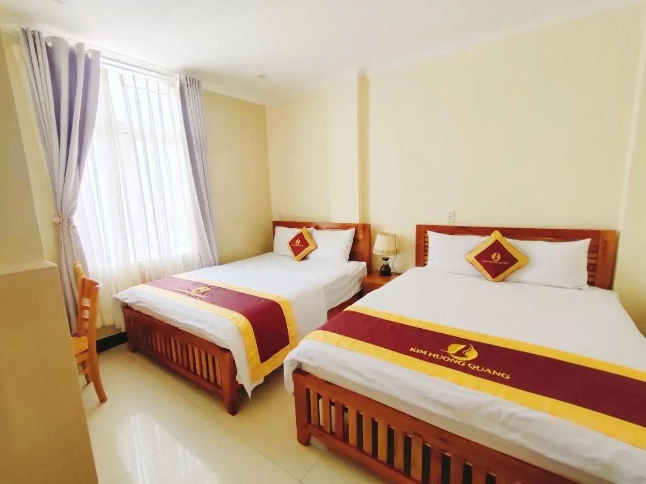 Bed in Kim Huong Quang Hotel