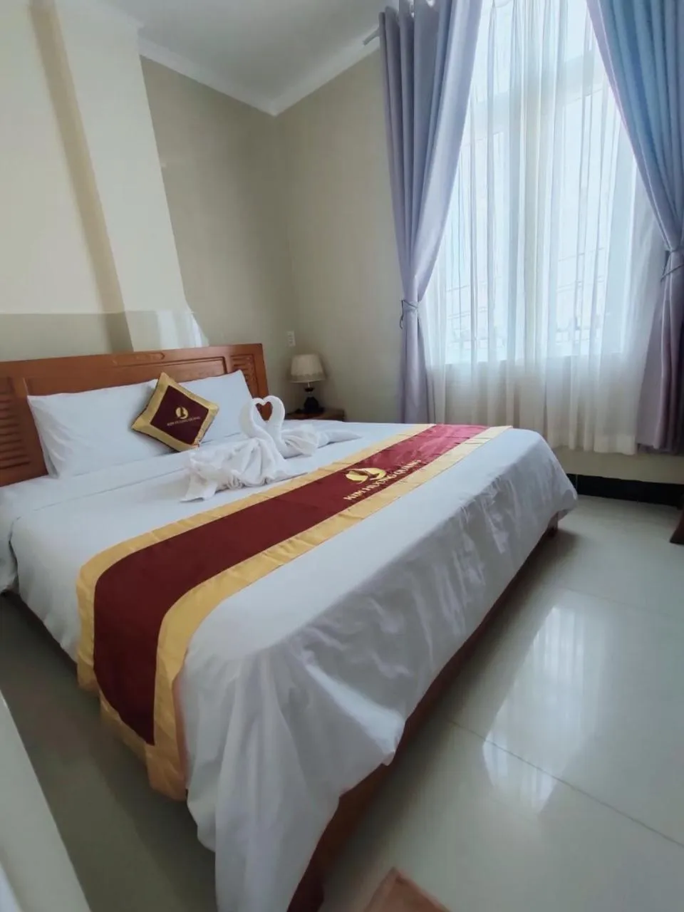 Bed in Kim Huong Quang Hotel