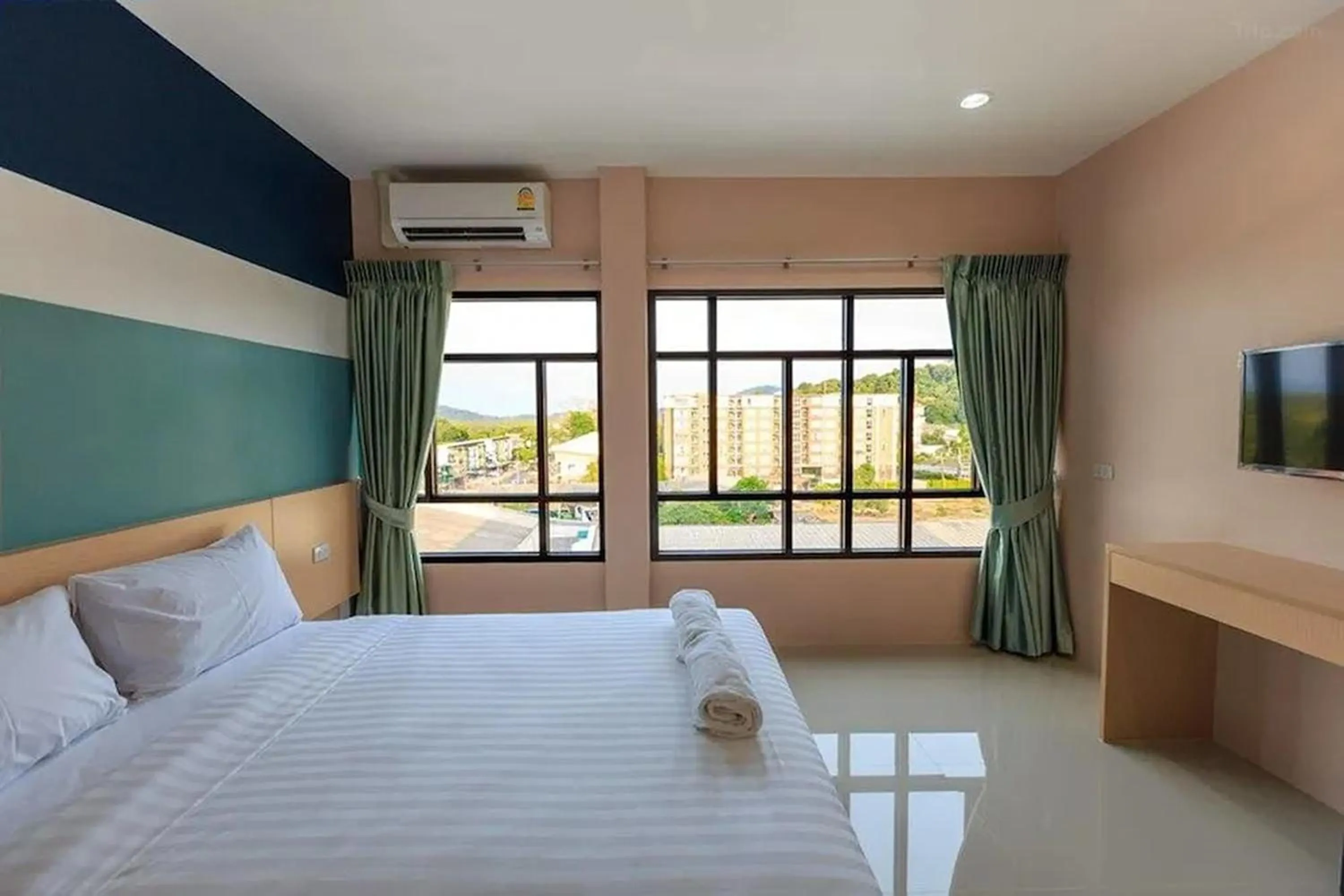 Bed in JJ Residence Phuket Town