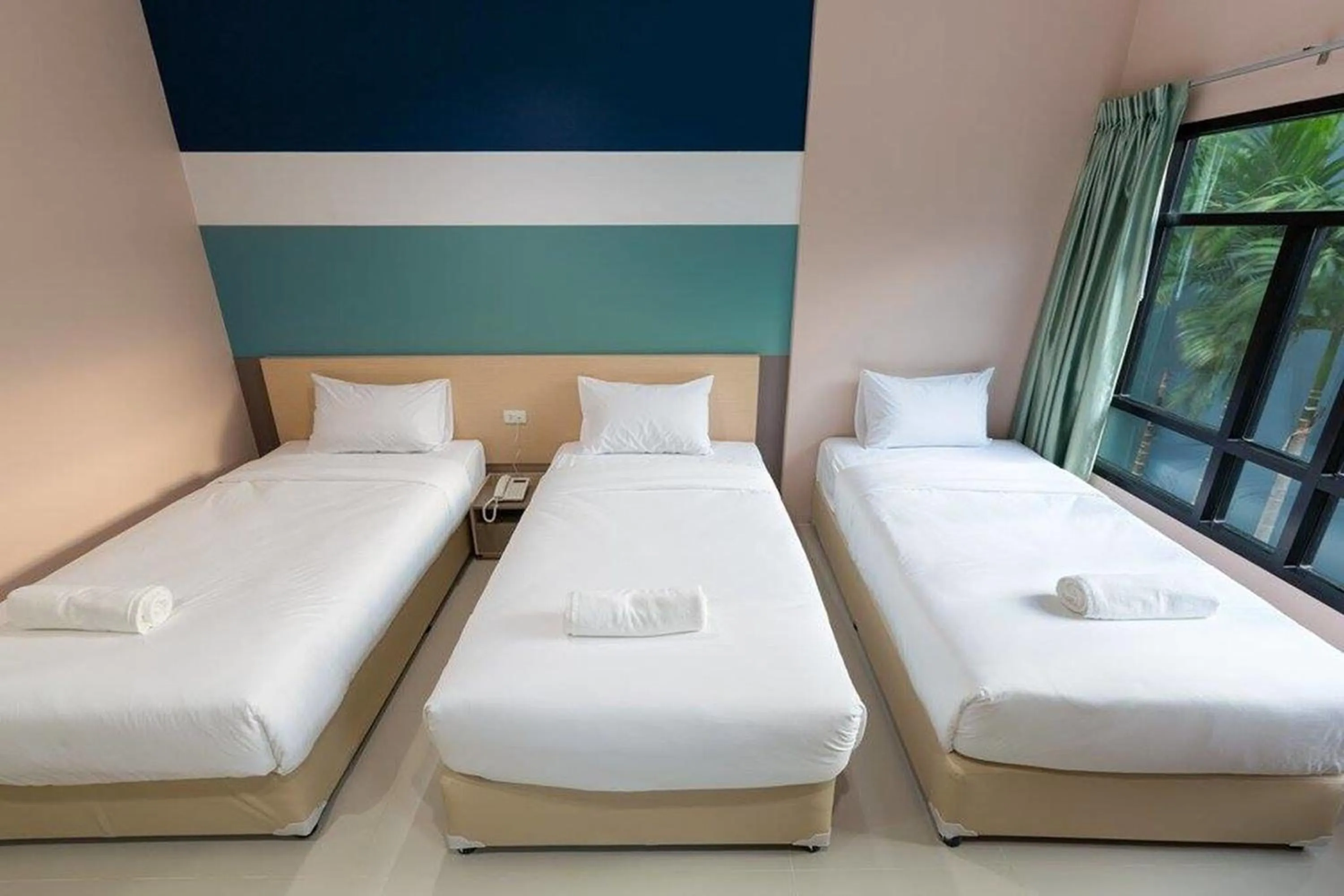 Bed in JJ Residence Phuket Town