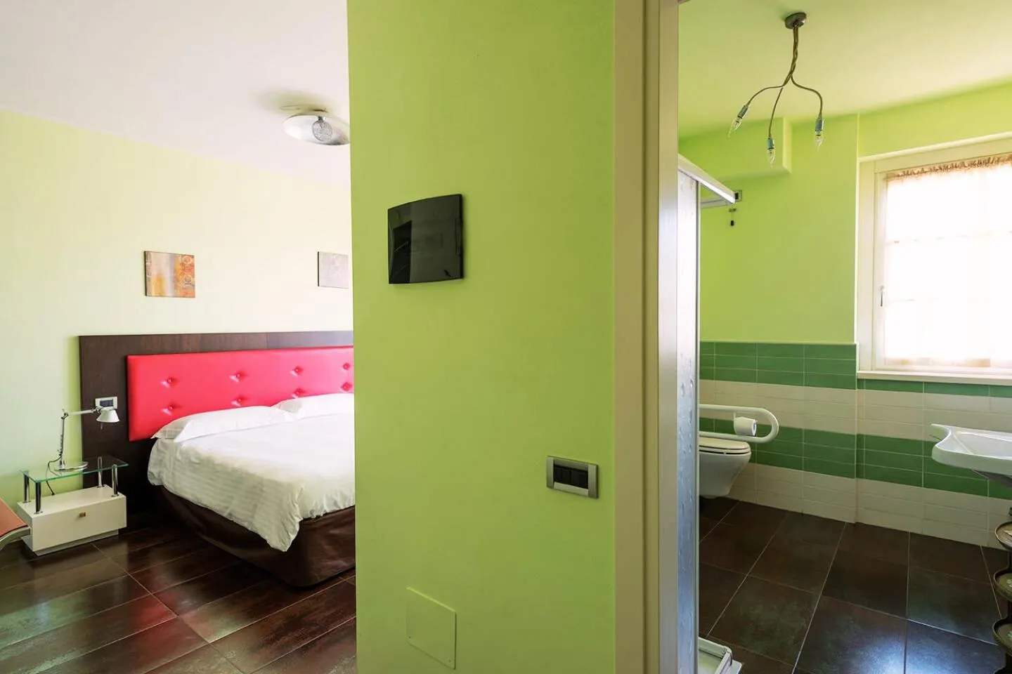 Bed in T'AMI Hotel Resort Spa