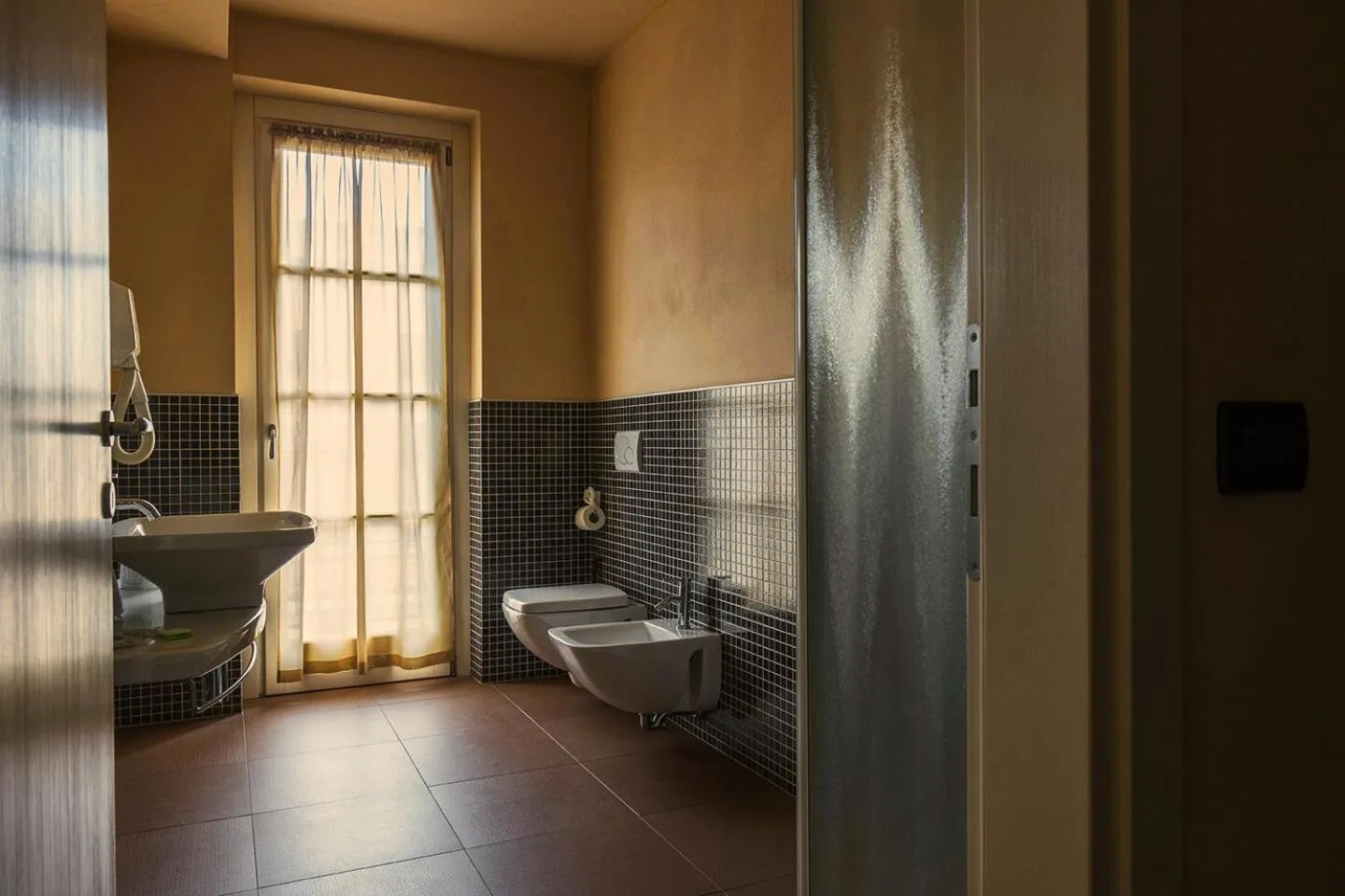 Toilet in T'AMI Hotel Resort Spa