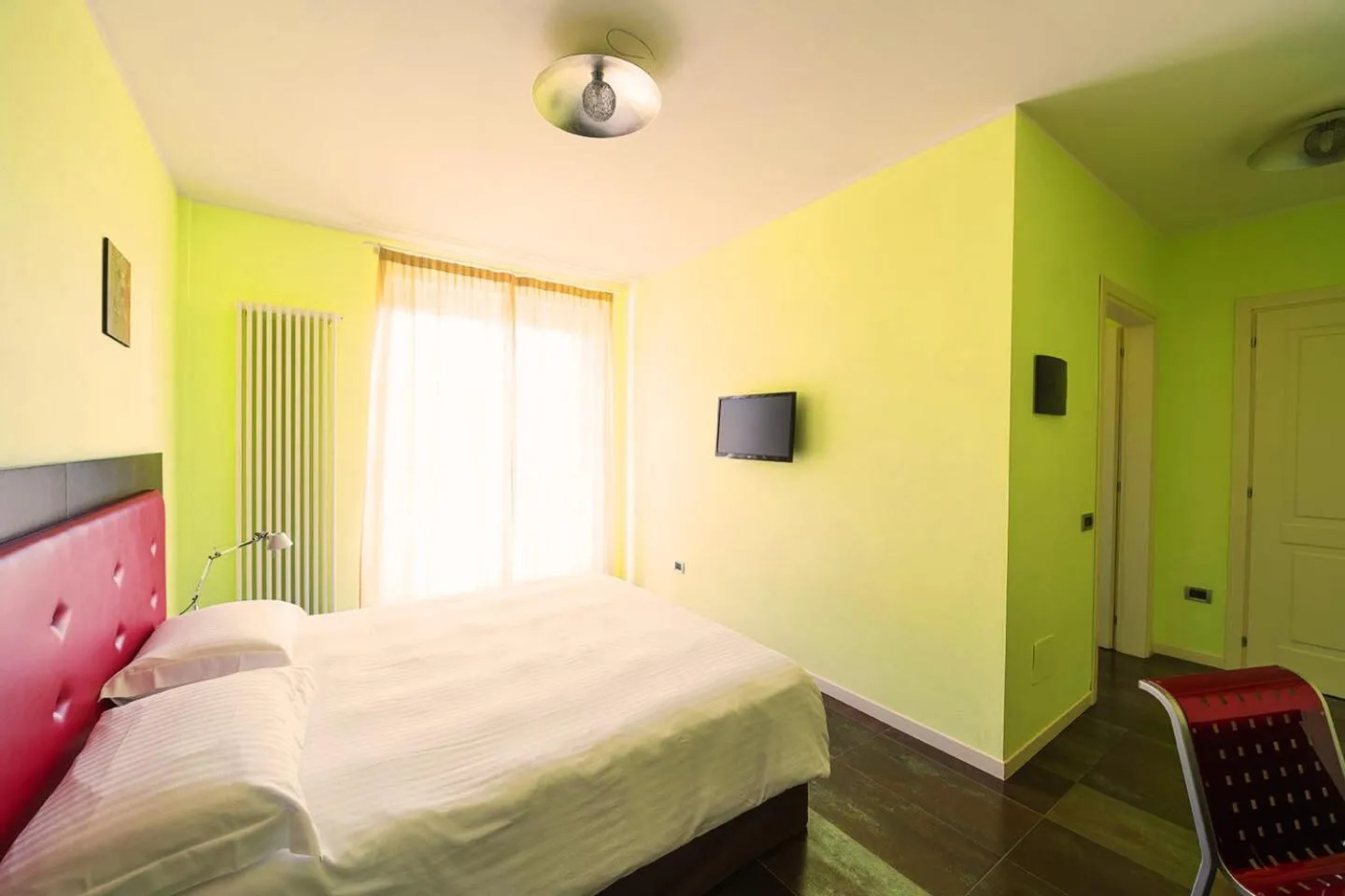 Bed in T'AMI Hotel Resort Spa