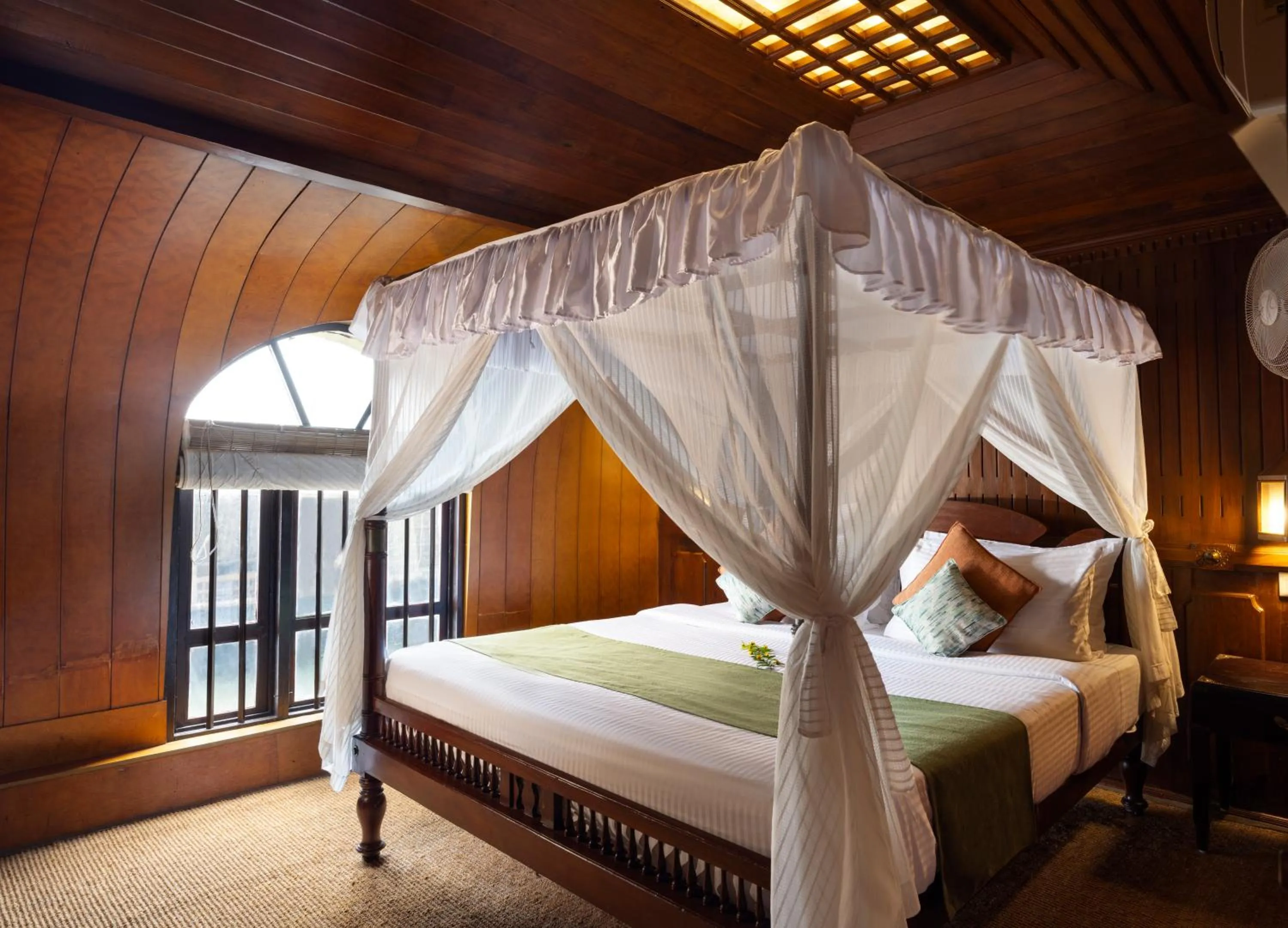 Bed in Spice Coast Cruises - Houseboat, A CGH Earth Experience