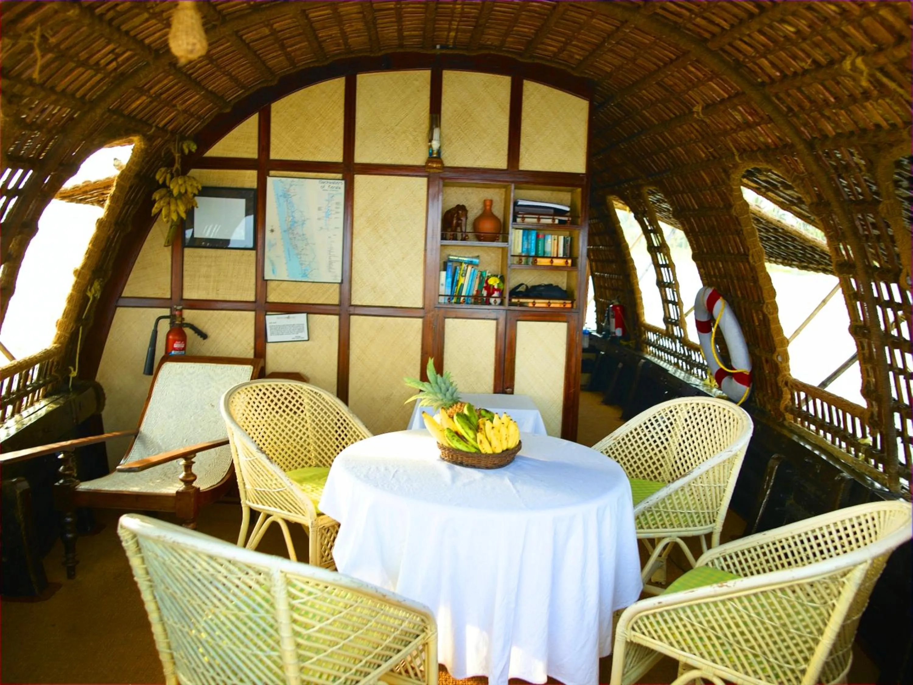 Dining area in Spice Coast Cruises - Houseboat, A CGH Earth Experience