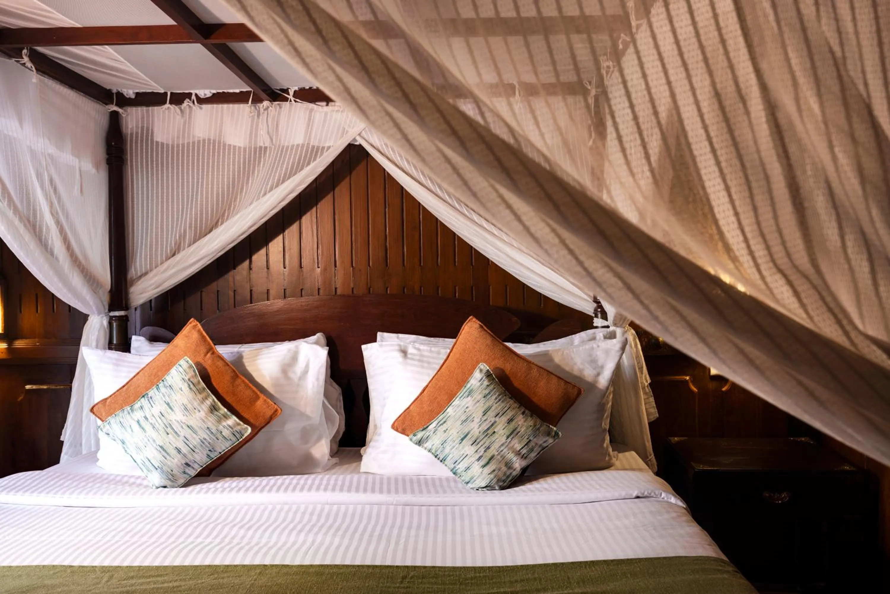Bed in Spice Coast Cruises - Houseboat, A CGH Earth Experience
