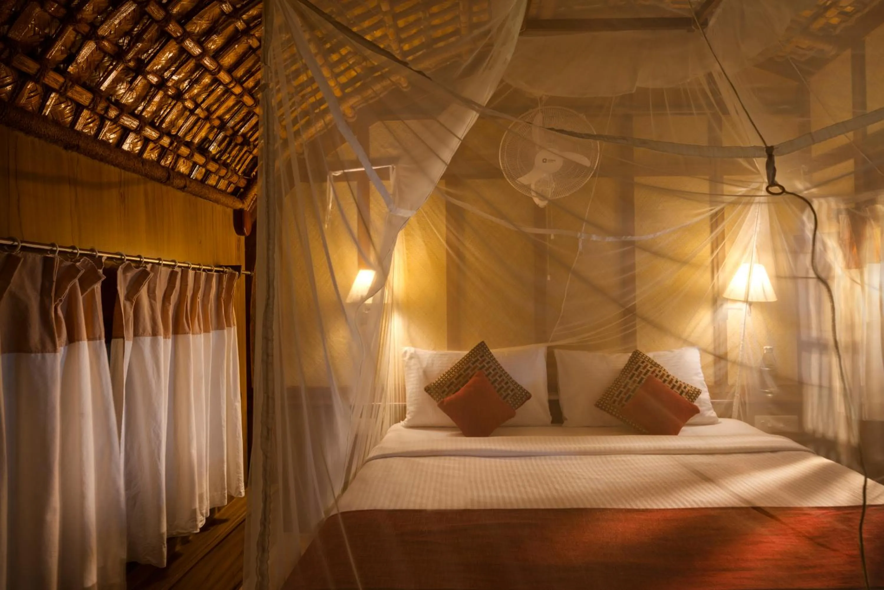 Bed in Spice Coast Cruises - Houseboat, A CGH Earth Experience