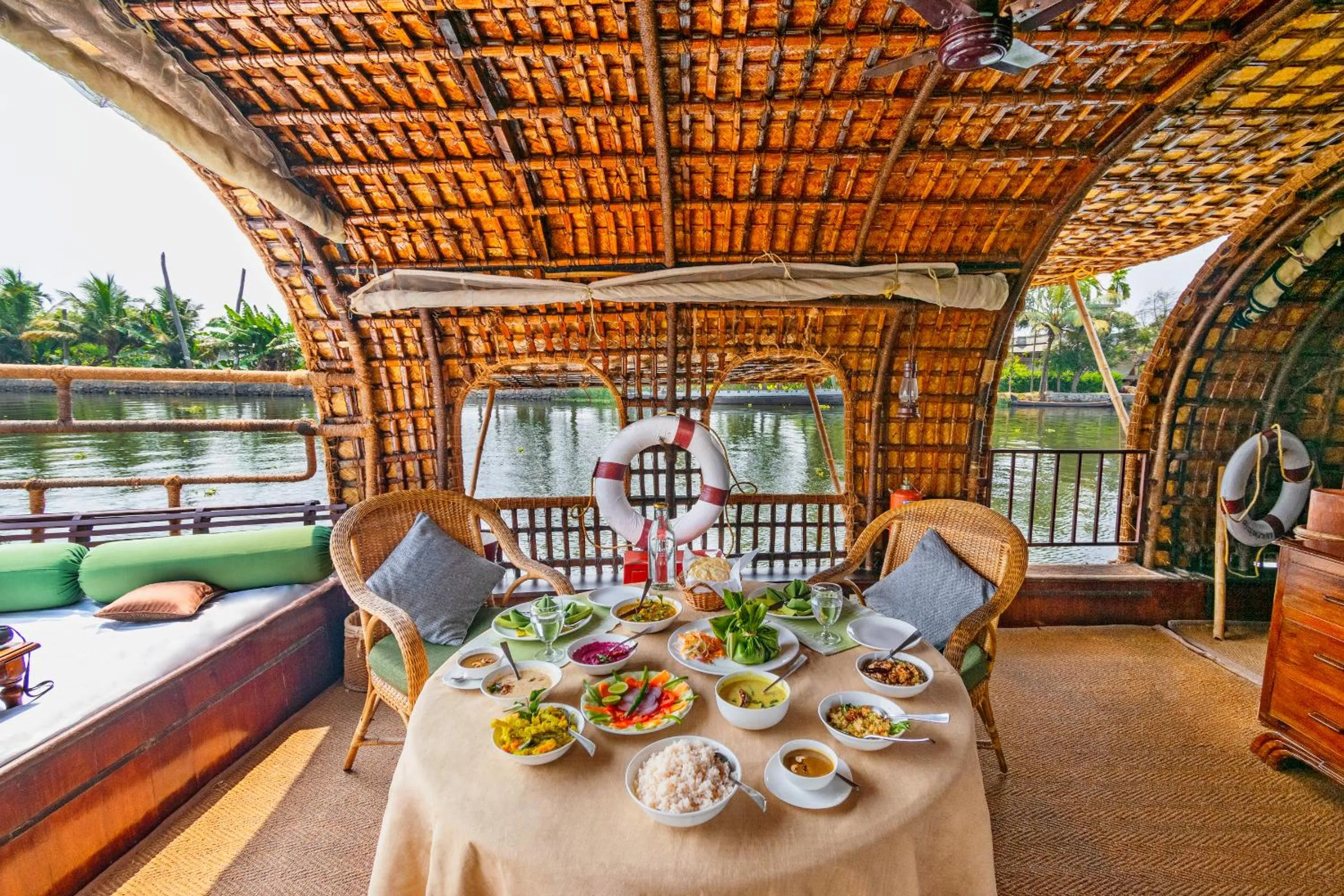 Seating area in Spice Coast Cruises - Houseboat, A CGH Earth Experience