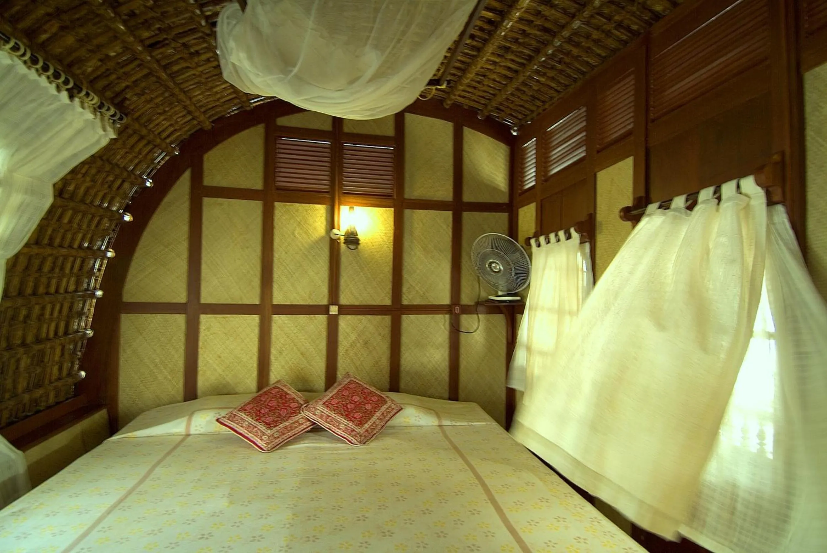 Bed in Spice Coast Cruises - Houseboat, A CGH Earth Experience