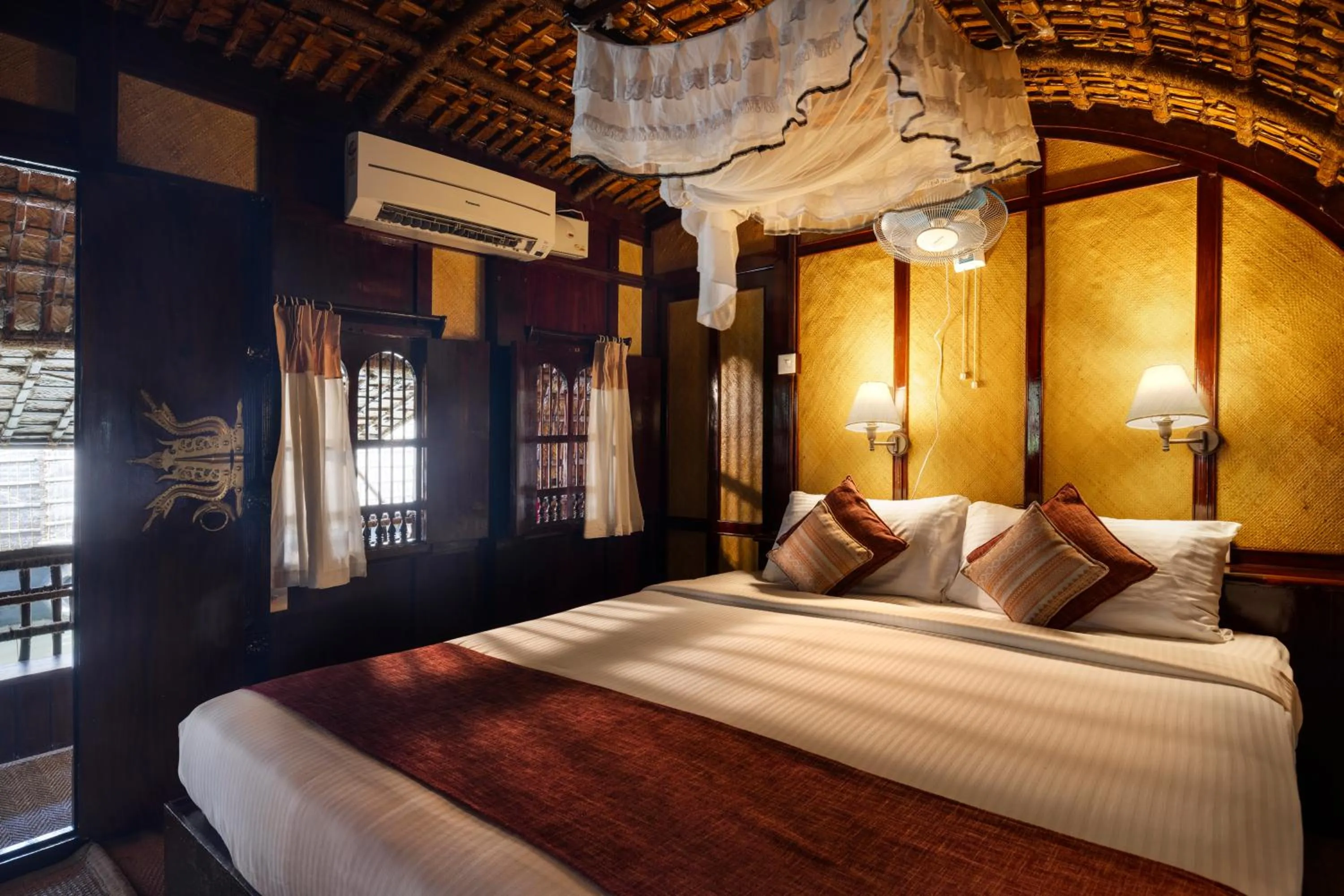 Bed in Spice Coast Cruises - Houseboat, A CGH Earth Experience