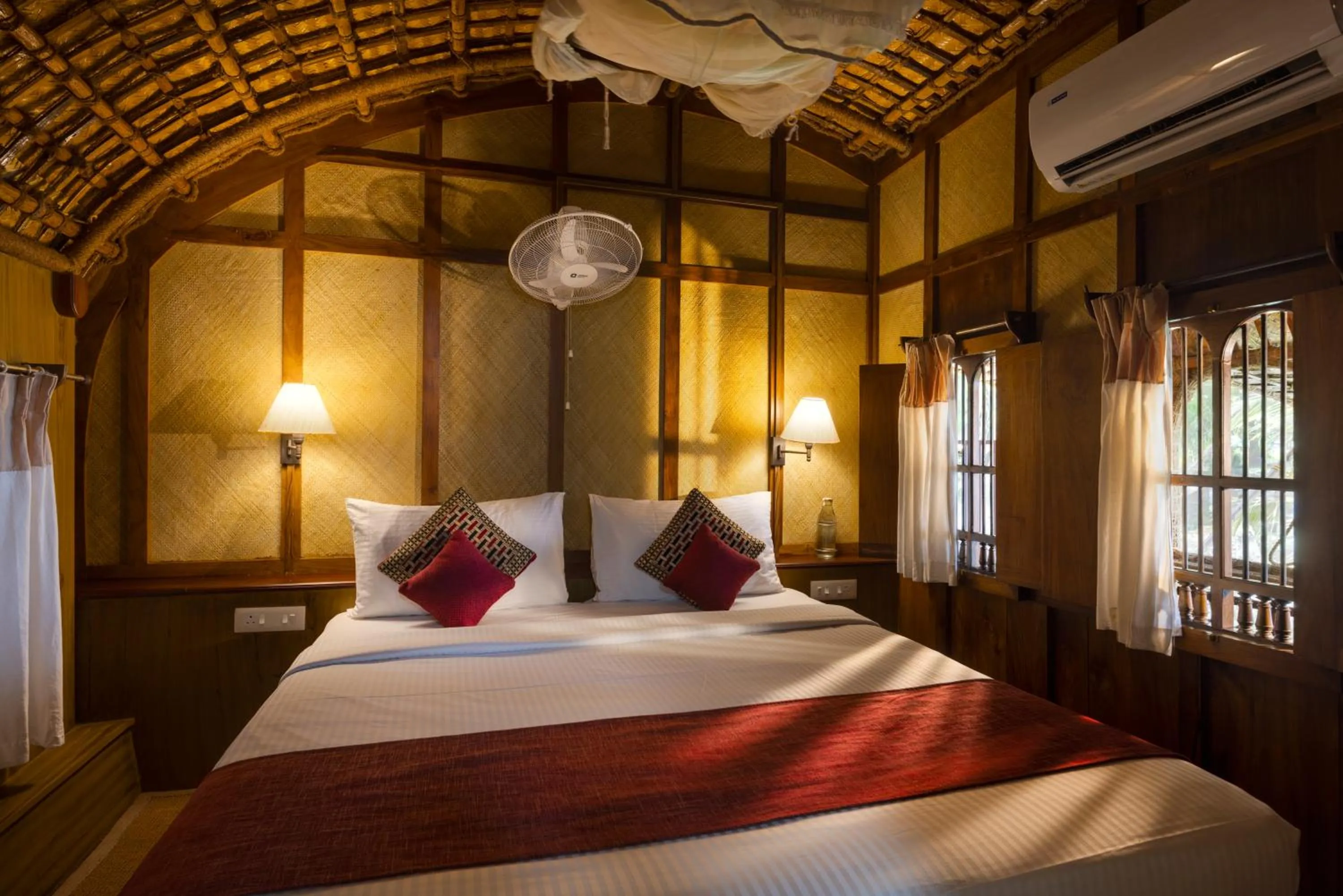 Bed in Spice Coast Cruises - Houseboat, A CGH Earth Experience