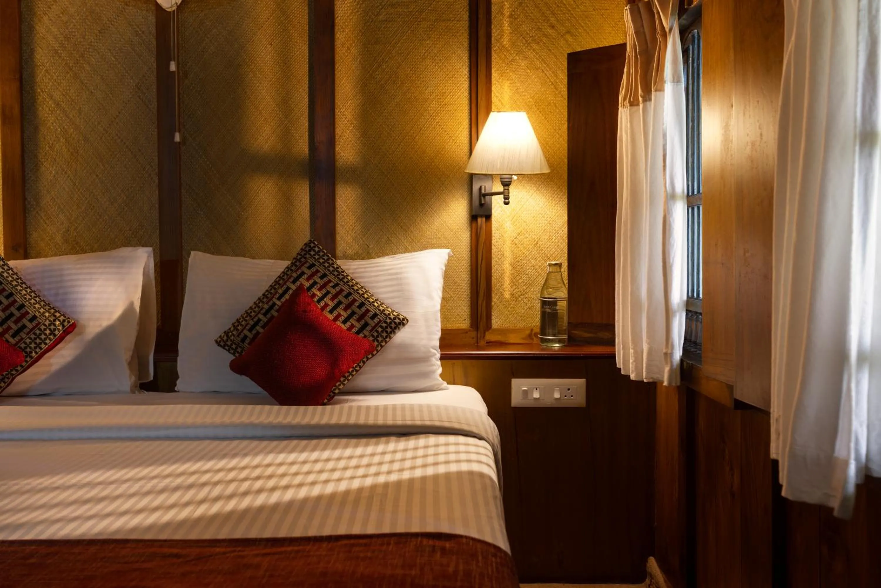 Bed in Spice Coast Cruises - Houseboat, A CGH Earth Experience