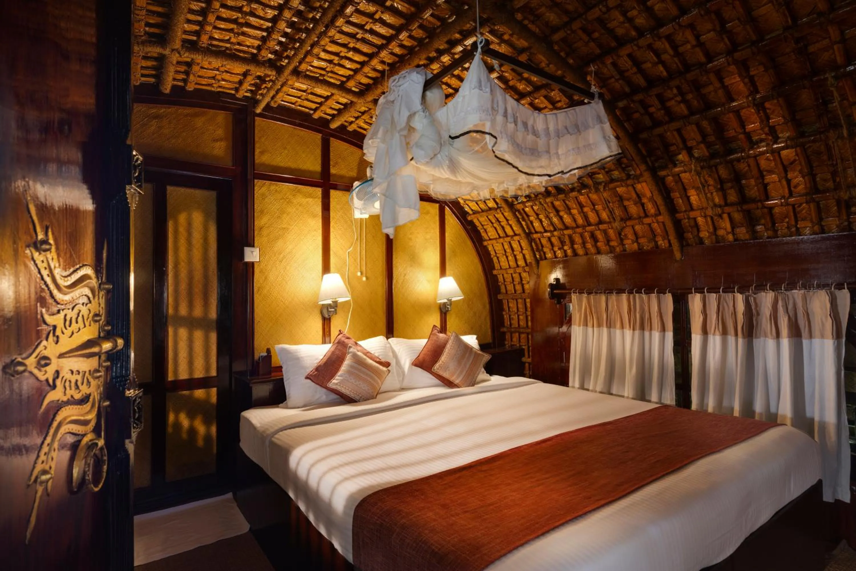 Bed in Spice Coast Cruises - Houseboat, A CGH Earth Experience