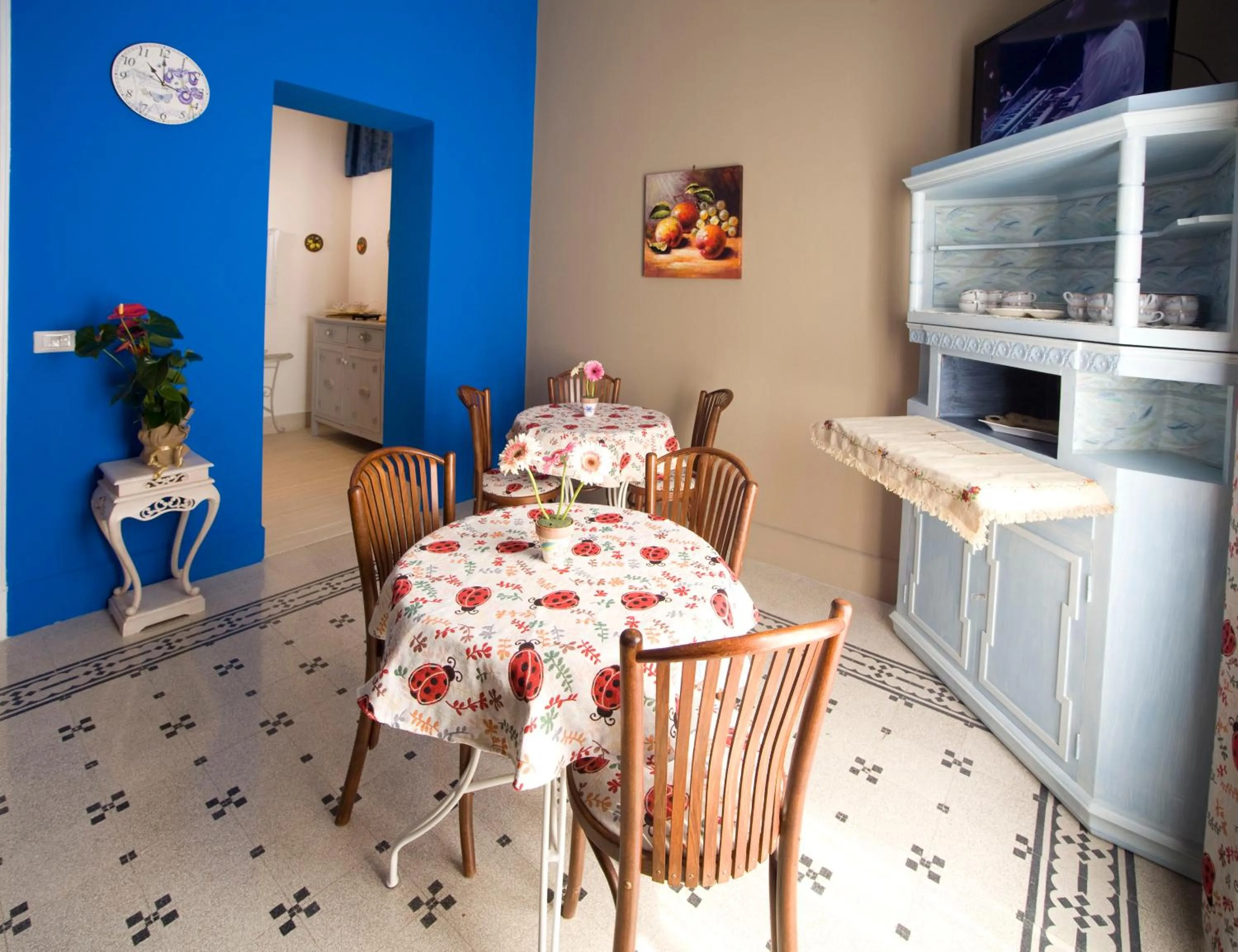 Communal lounge/ TV room in B&B Antonello da Messina