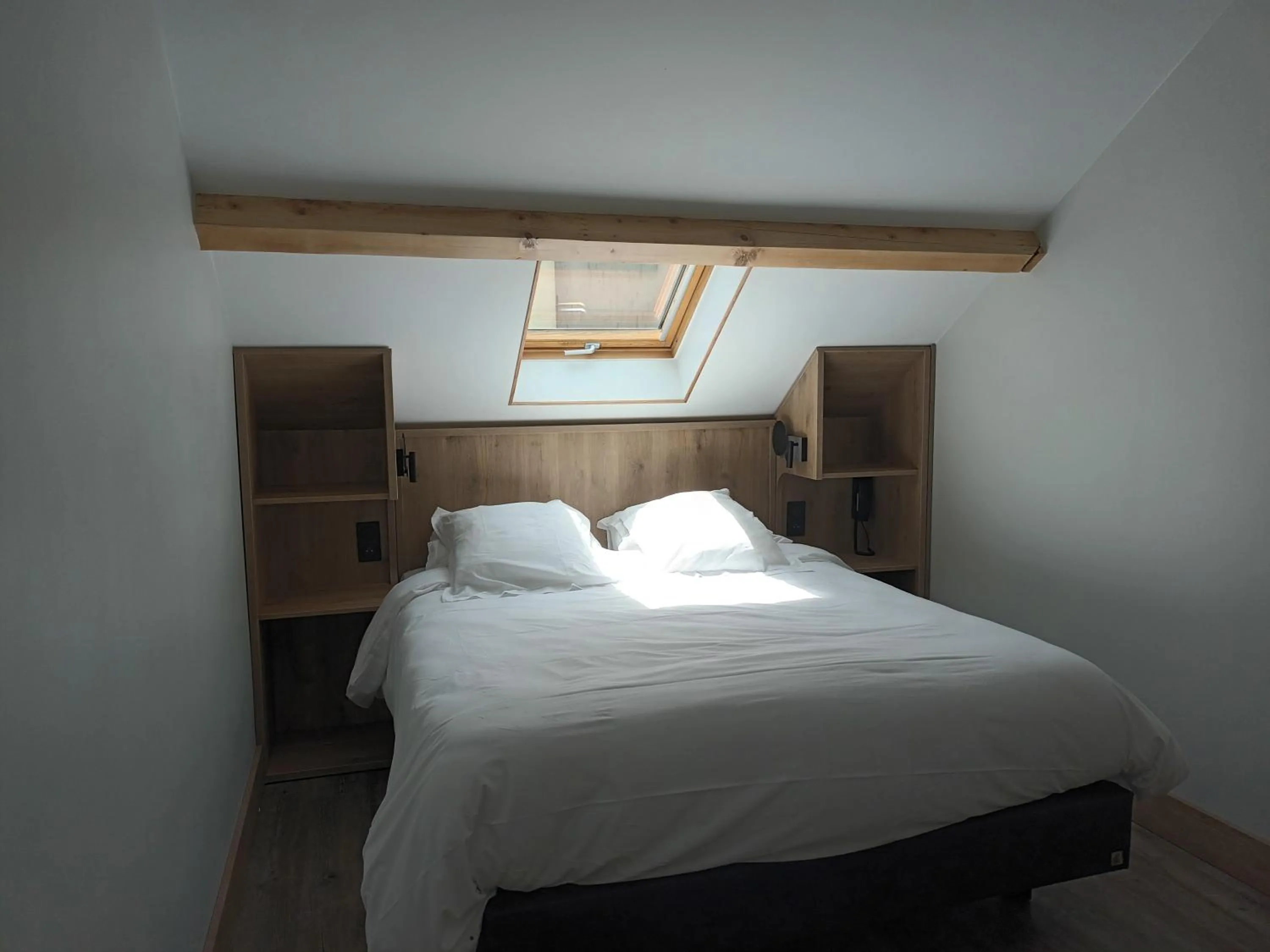 Photo of the whole room, Bed in Hôtel-Restaurant Logis l'Aubrac Laguiole