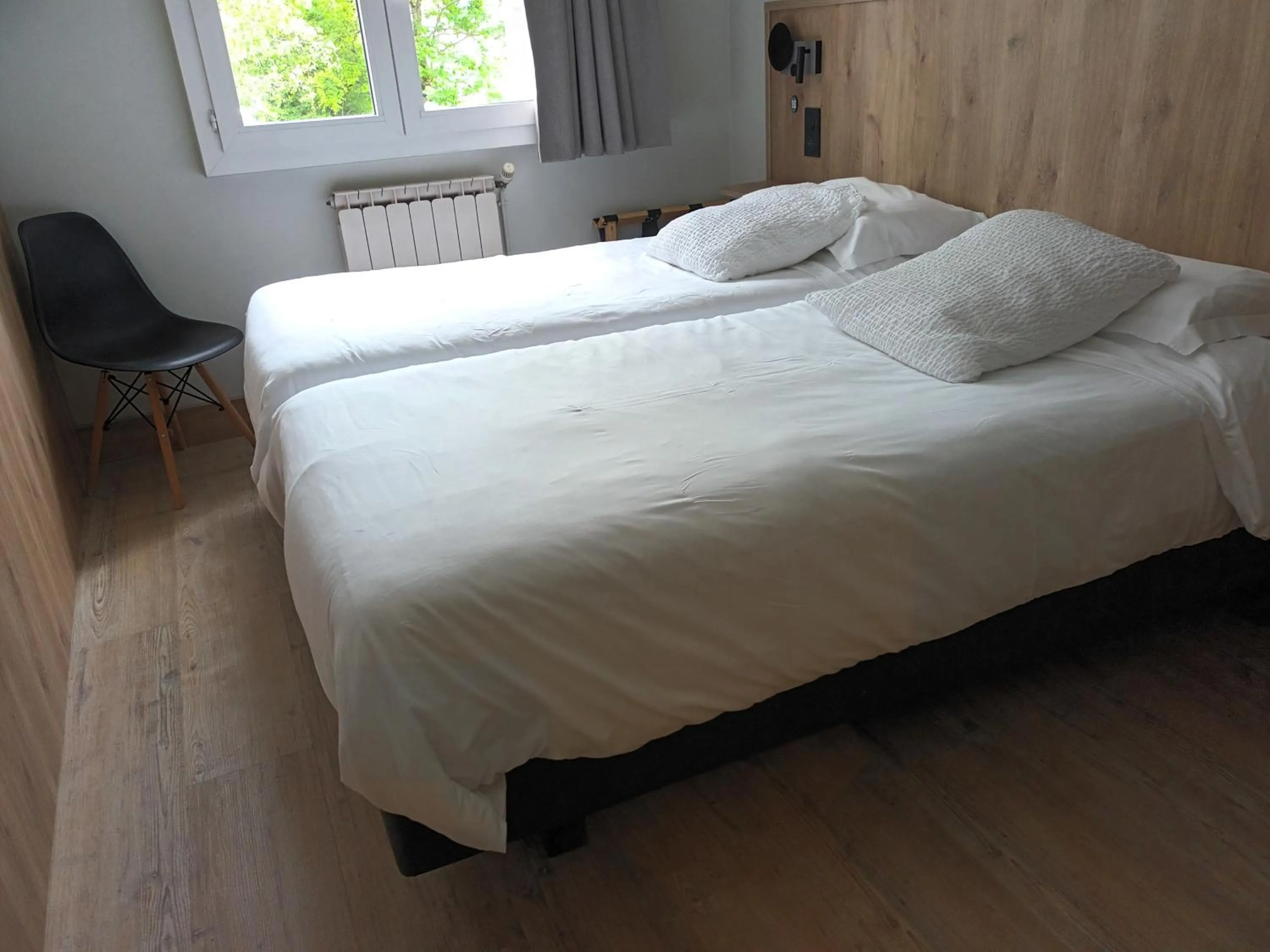 Bed in Hôtel-Restaurant Logis l'Aubrac Laguiole