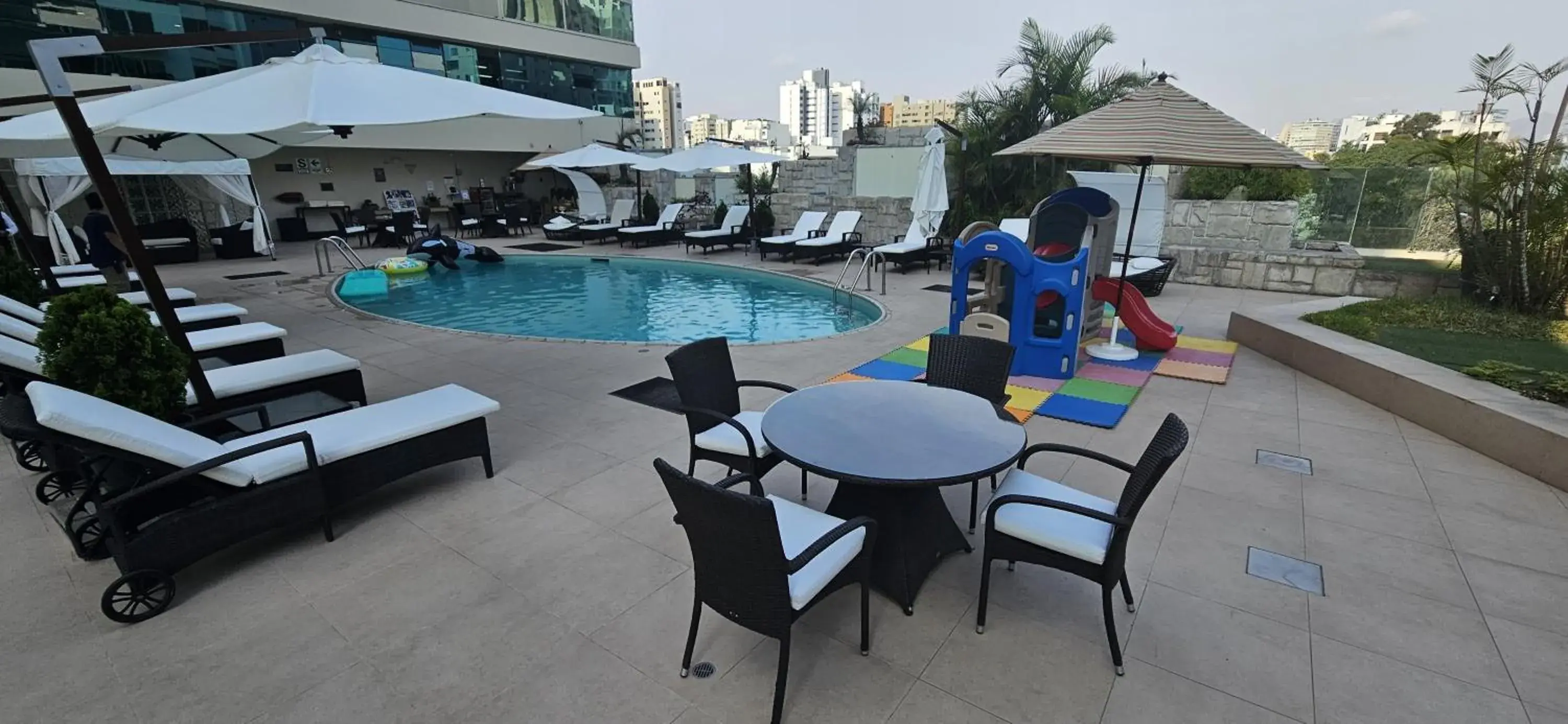 Swimming pool in Delfines Hotel & Convention Center Swimming pool in Delfines Hotel & Convention Center