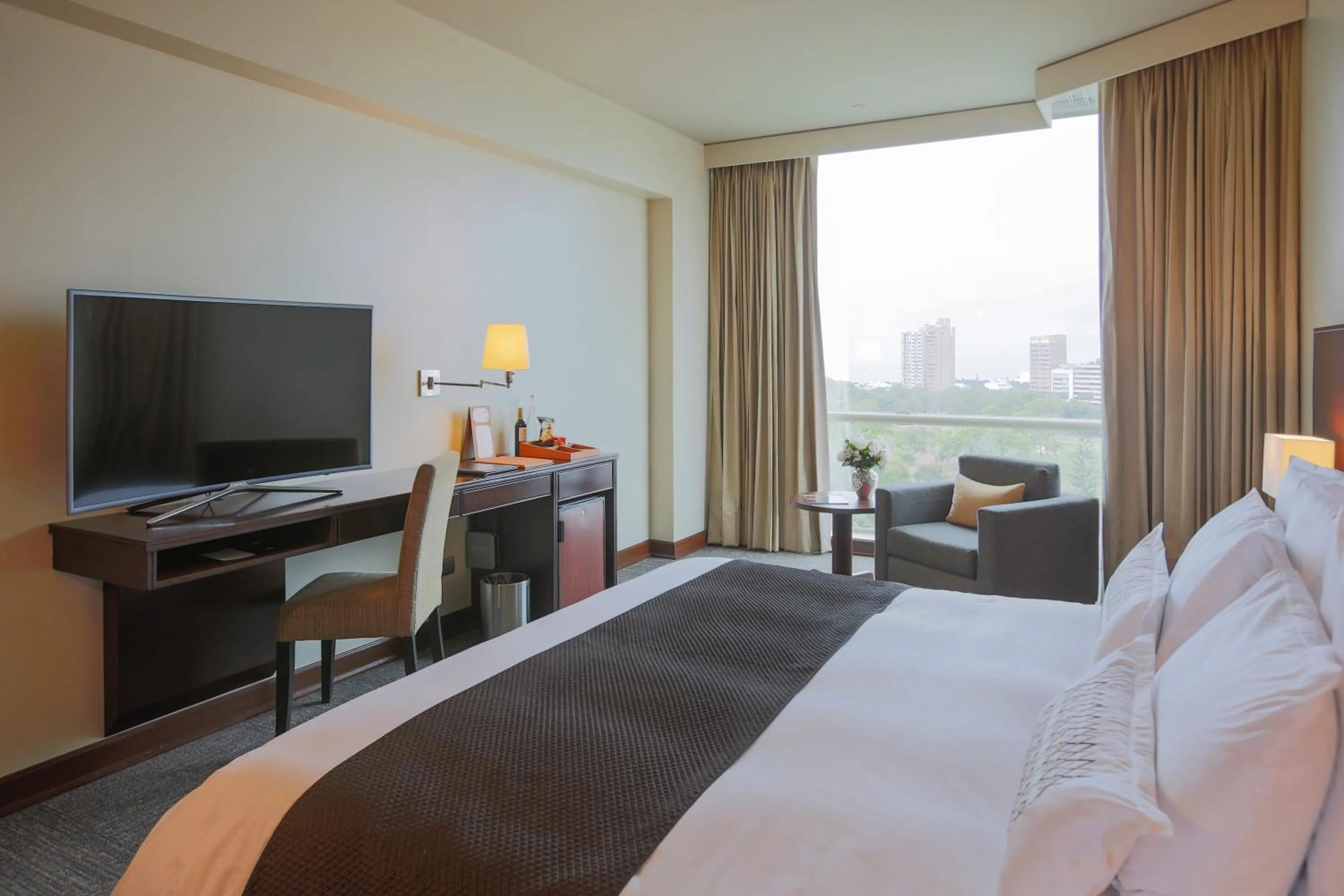 Bed in Delfines Hotel & Convention Center