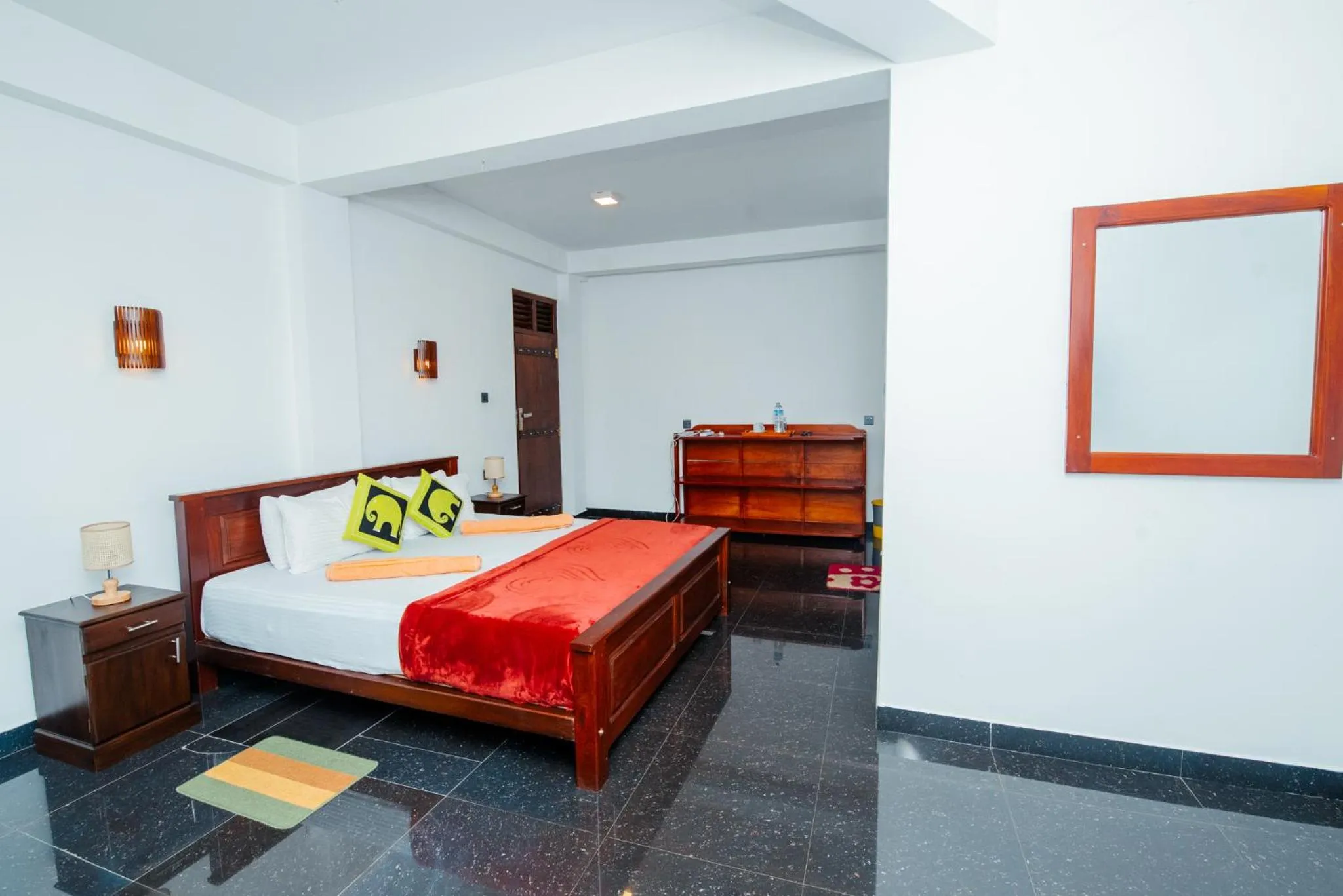 Bed in Adams Peak Inn