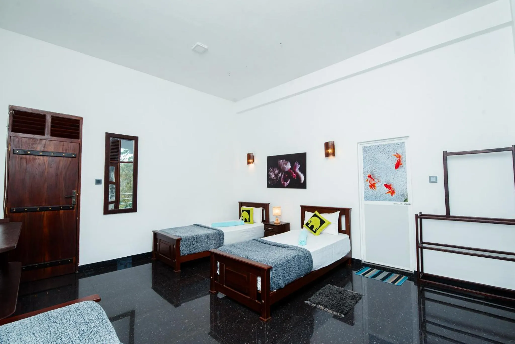 Bed in Adams Peak Inn