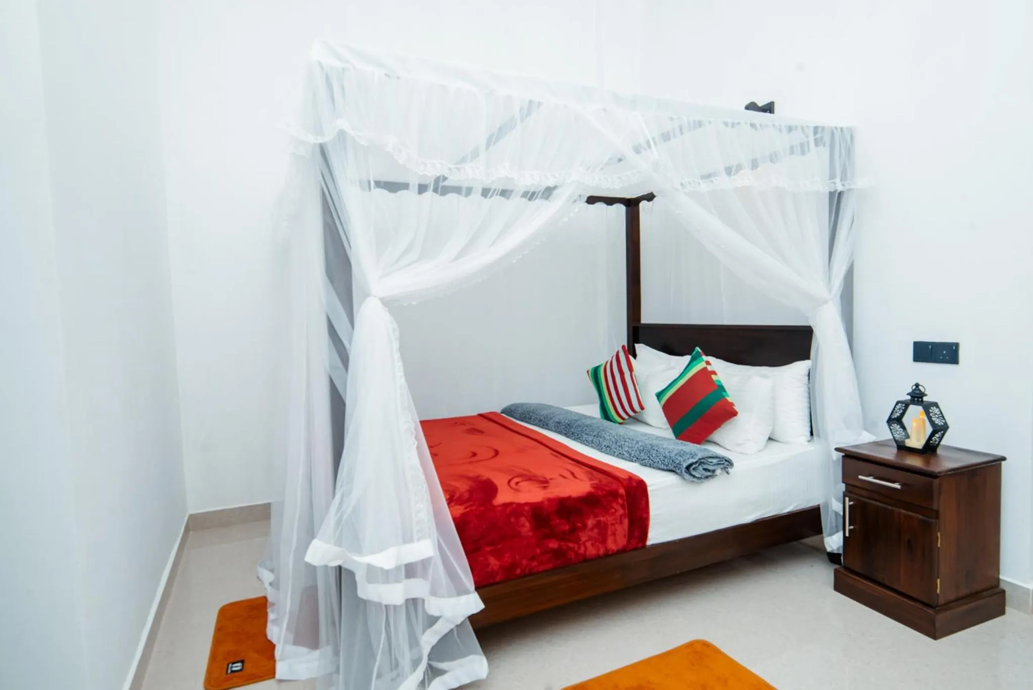 Bed in Adams Peak Inn