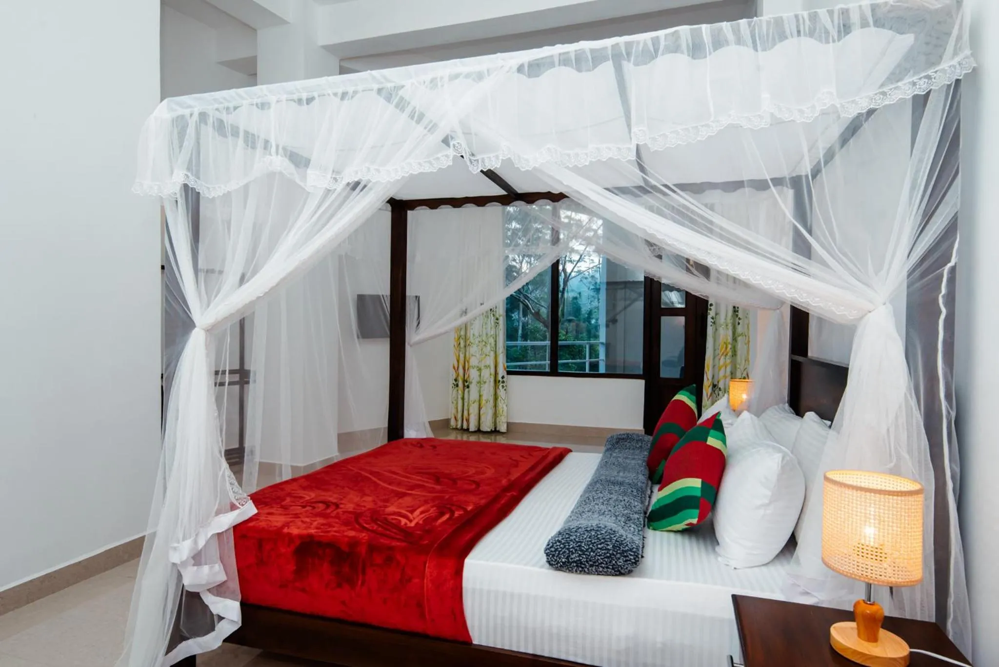 Bed in Adams Peak Inn