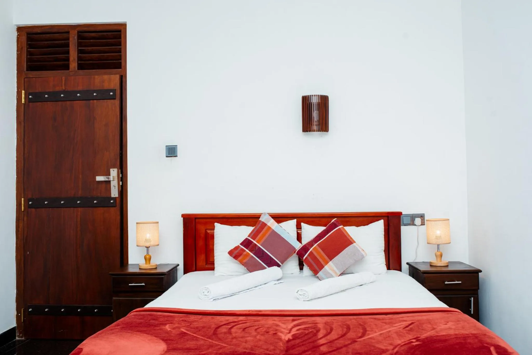 Bed in Adams Peak Inn