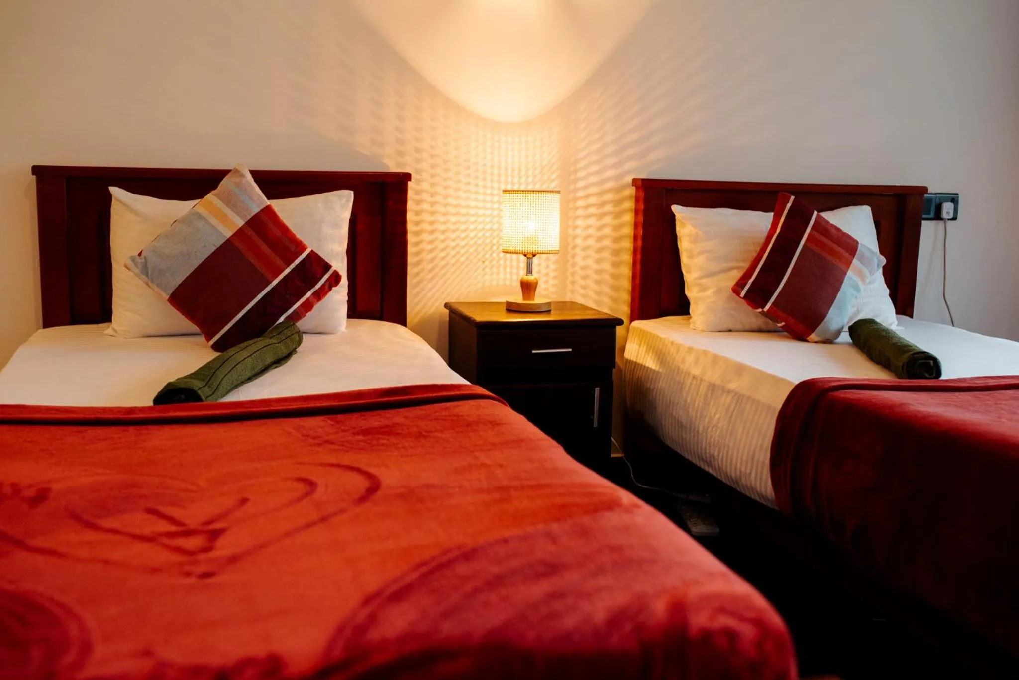 Bed in Adams Peak Inn