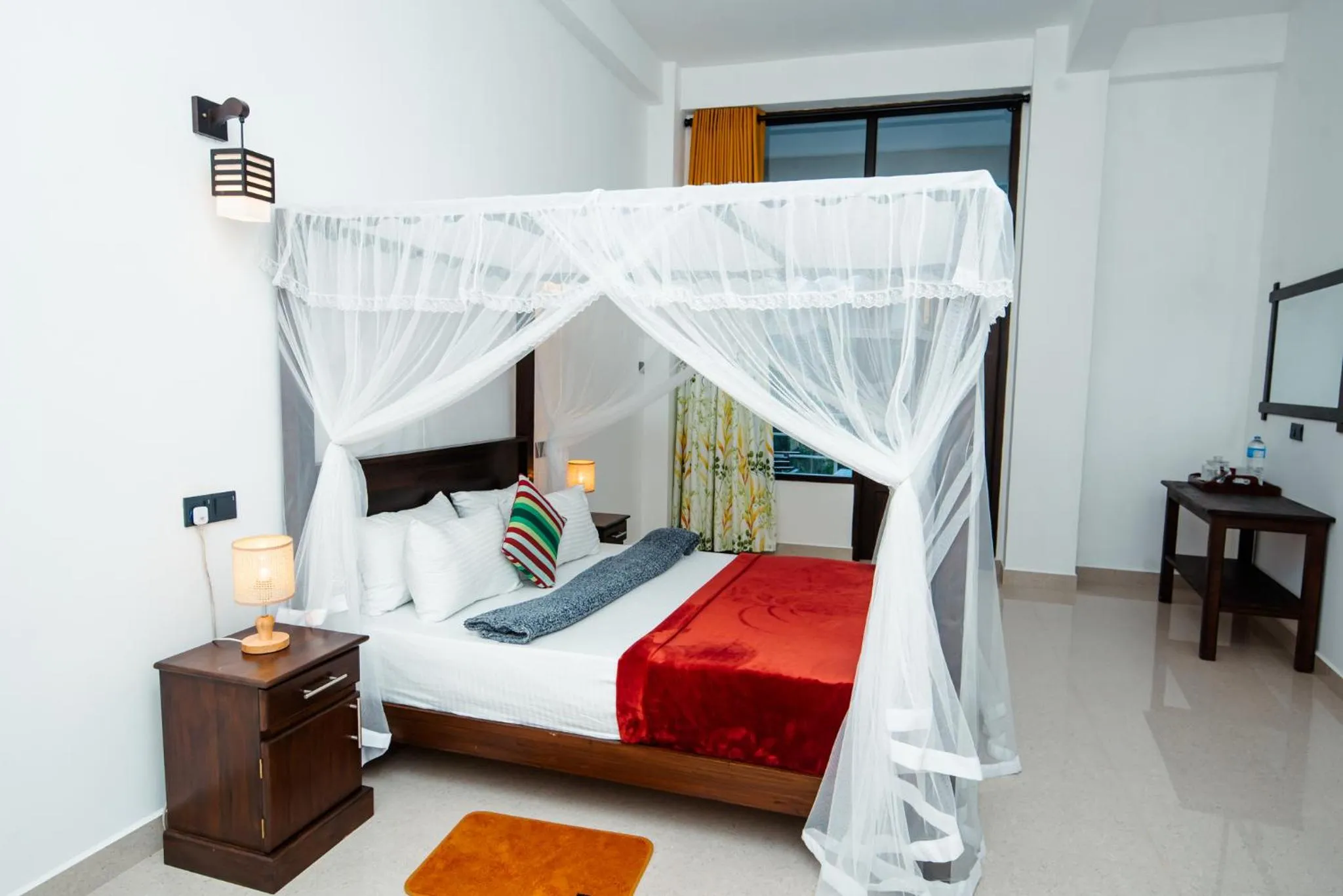 Bed in Adams Peak Inn