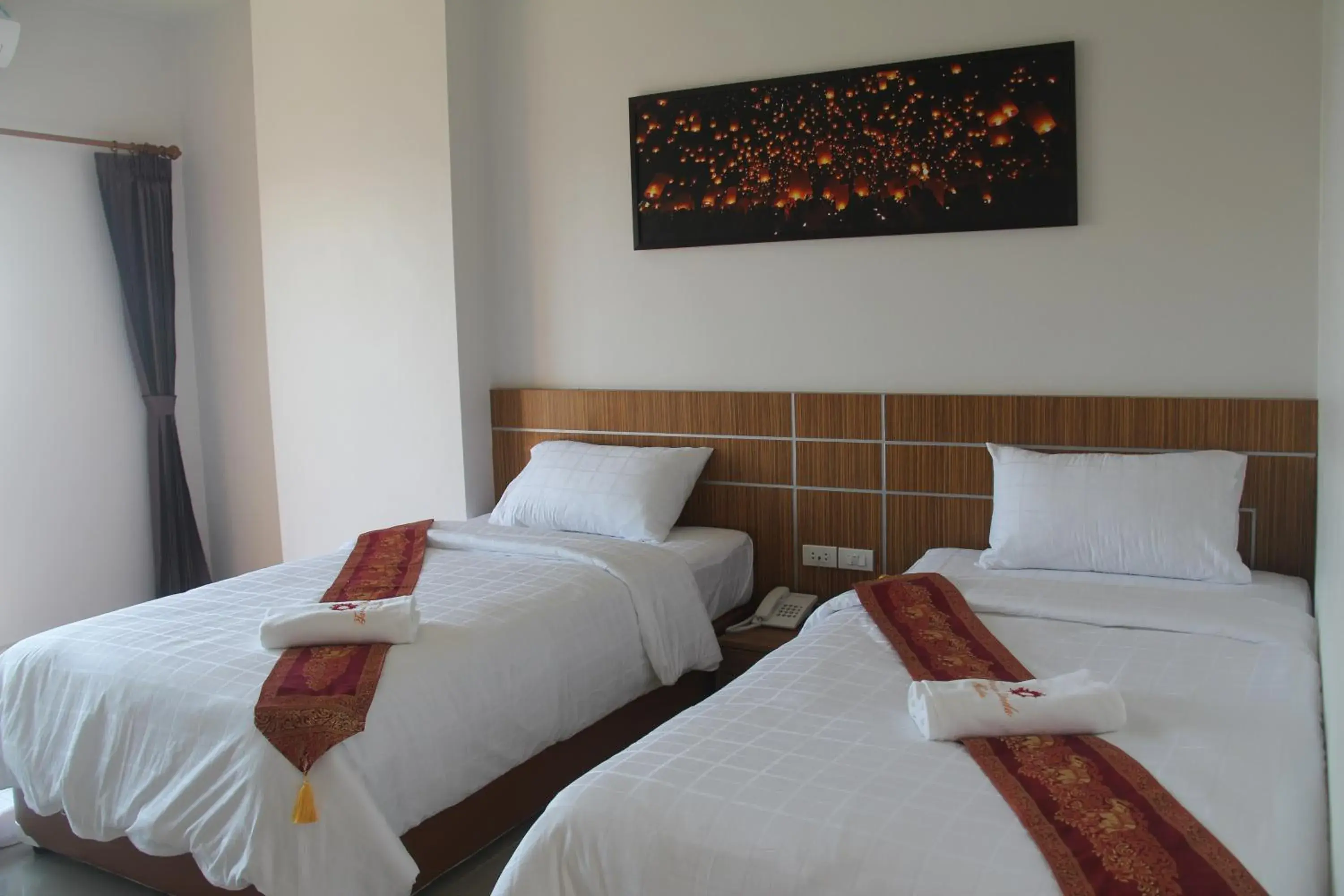 Bed in Tawan Anda Garden Hotel Bed in Tawan Anda Garden Hotel