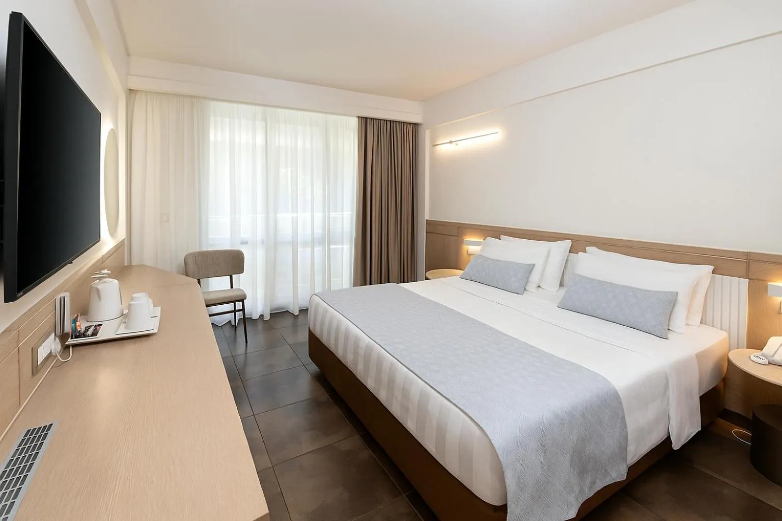 Photo of the whole room, Bed in Thalassa Beach Resort & Spa (Adults Only)