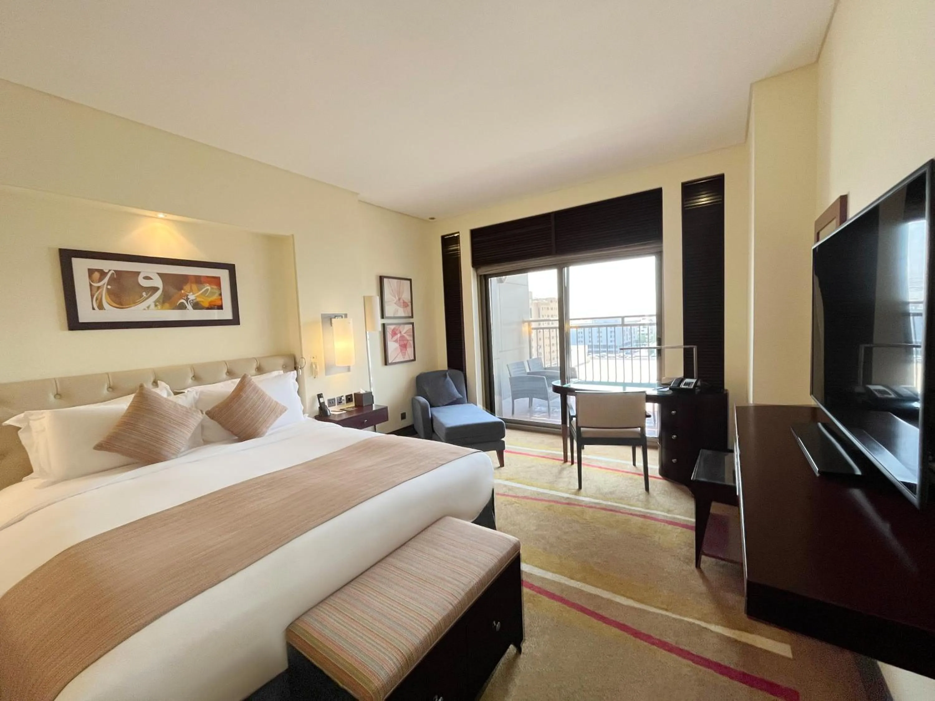 Communal lounge/ TV room, Bed in Sofitel Al Khobar The Corniche