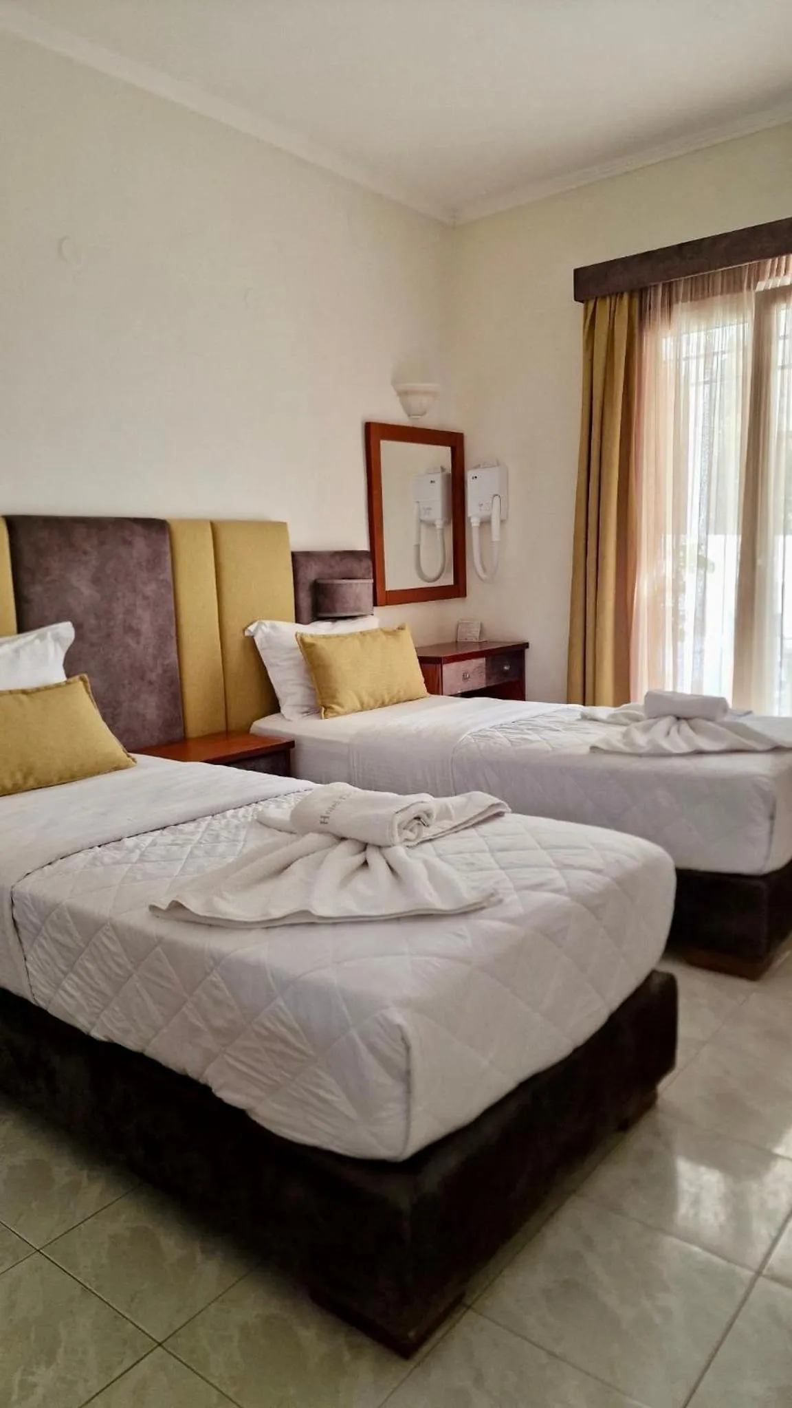 Bed in Hotel Dionysis Studios