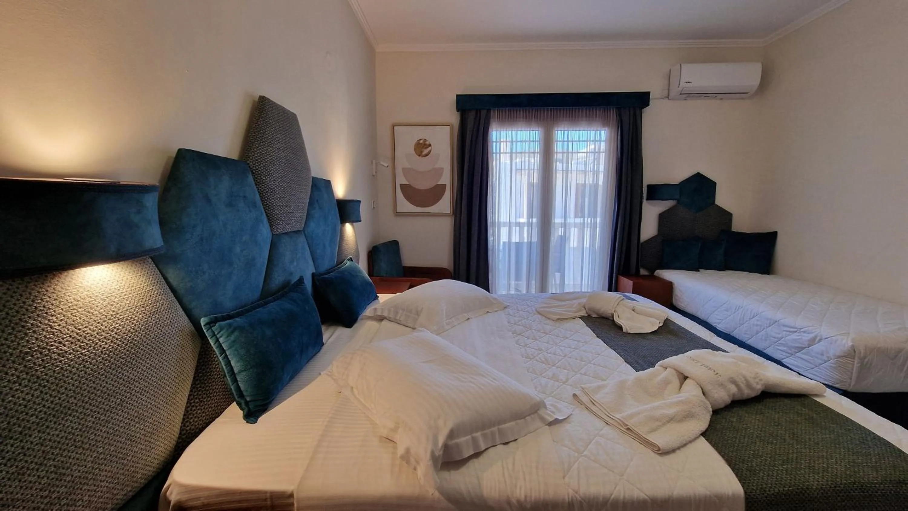 Bed in Hotel Dionysis Studios