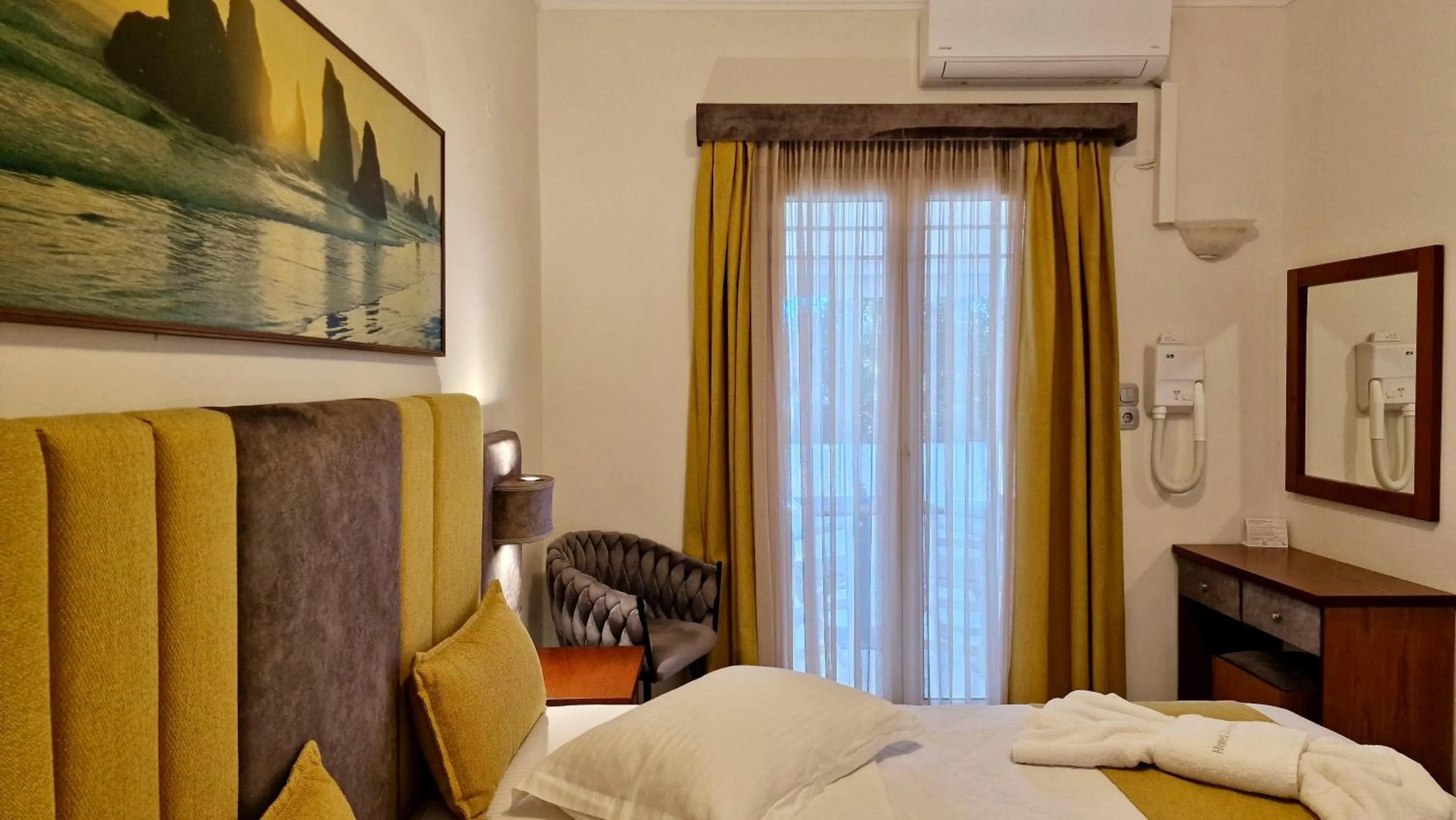 Bed in Hotel Dionysis Studios