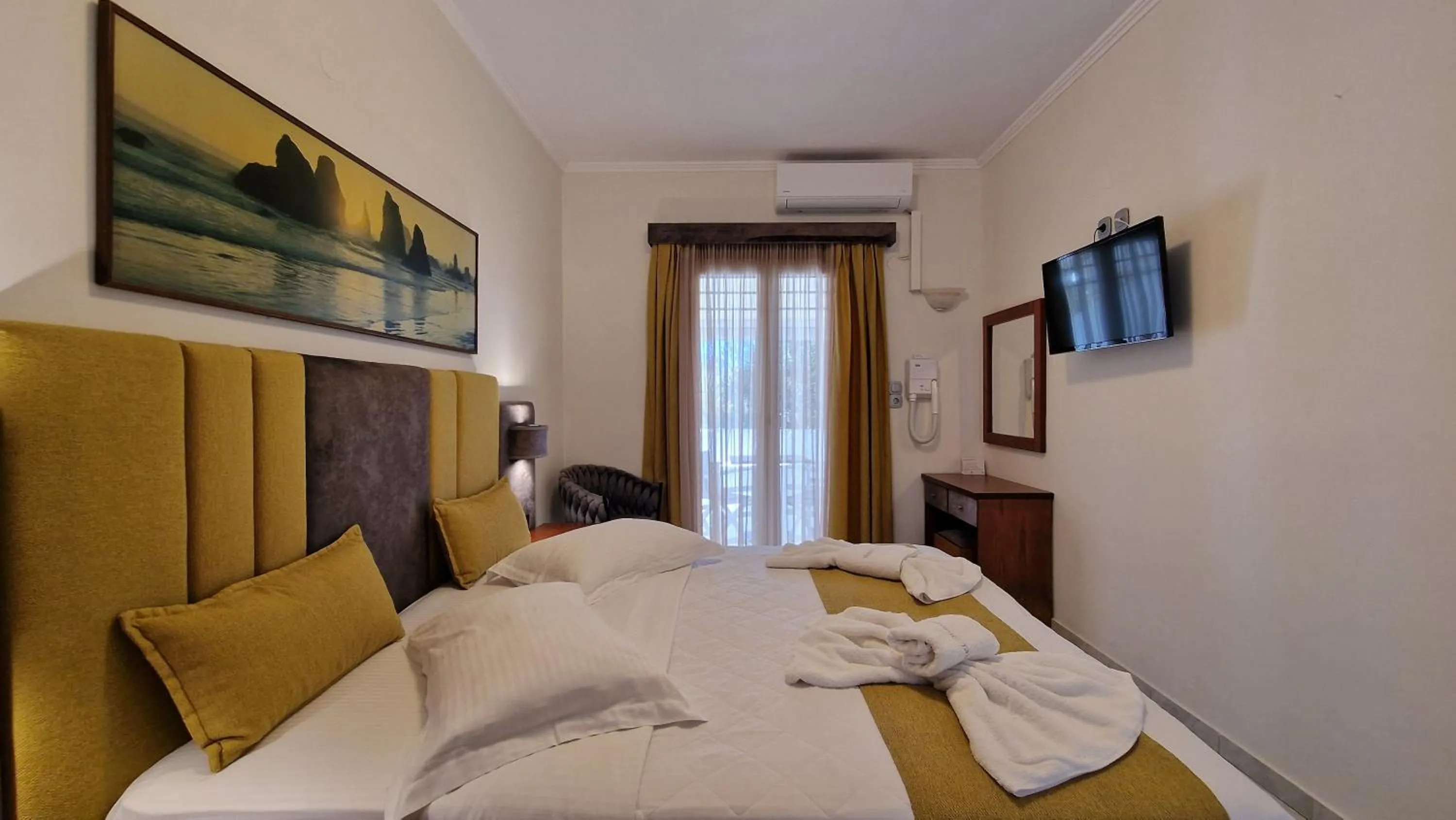 Bed in Hotel Dionysis Studios