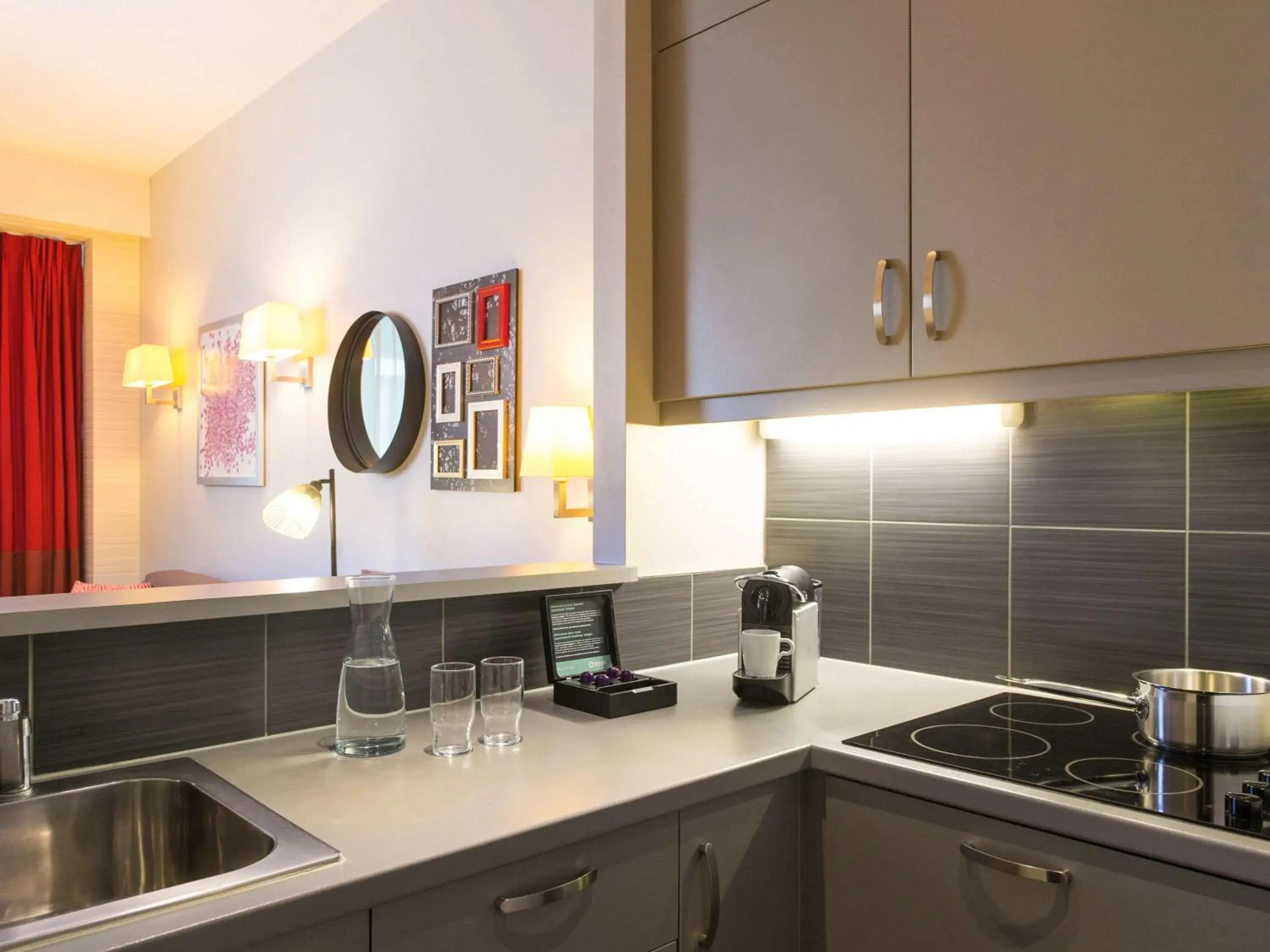 Photo of the whole room in Aparthotel Adagio Brussels Grand Place Photo of the whole room in Aparthotel Adagio Brussels Grand Place